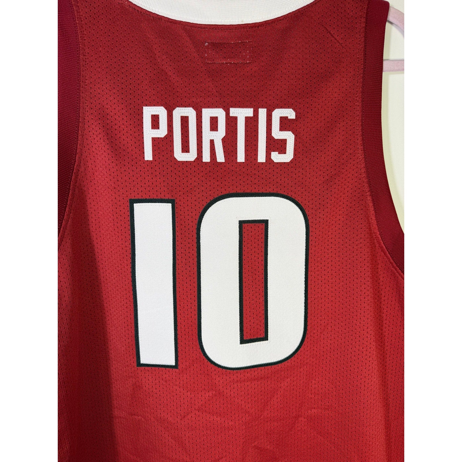Red Retro Brand Arkansas Razorbacks #10 basketball jersey for men, large size, featuring team logo and player number.