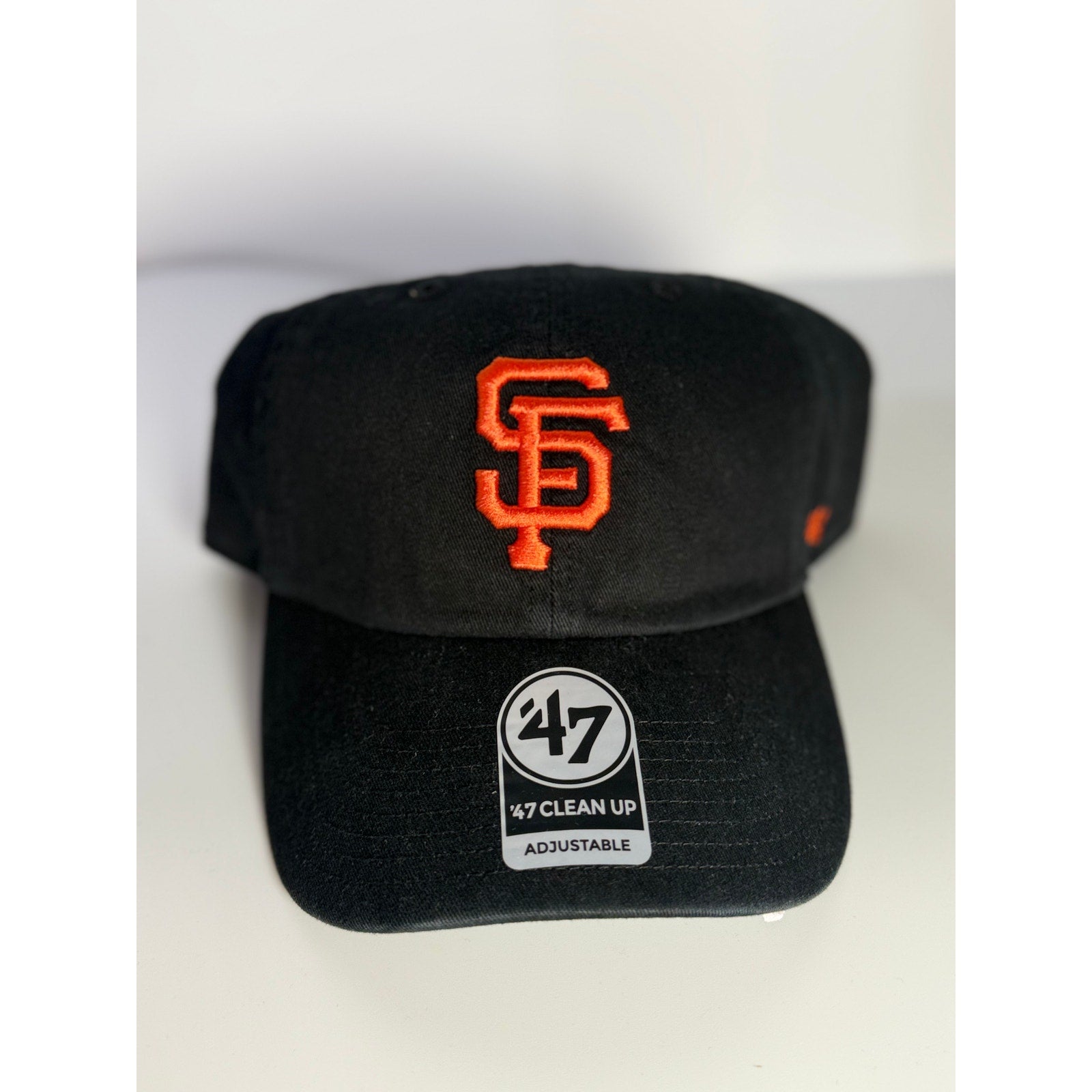 Black '47 San Francisco Giants Clean Up adjustable dad hat with curved brim and embroidered team logo on front.
