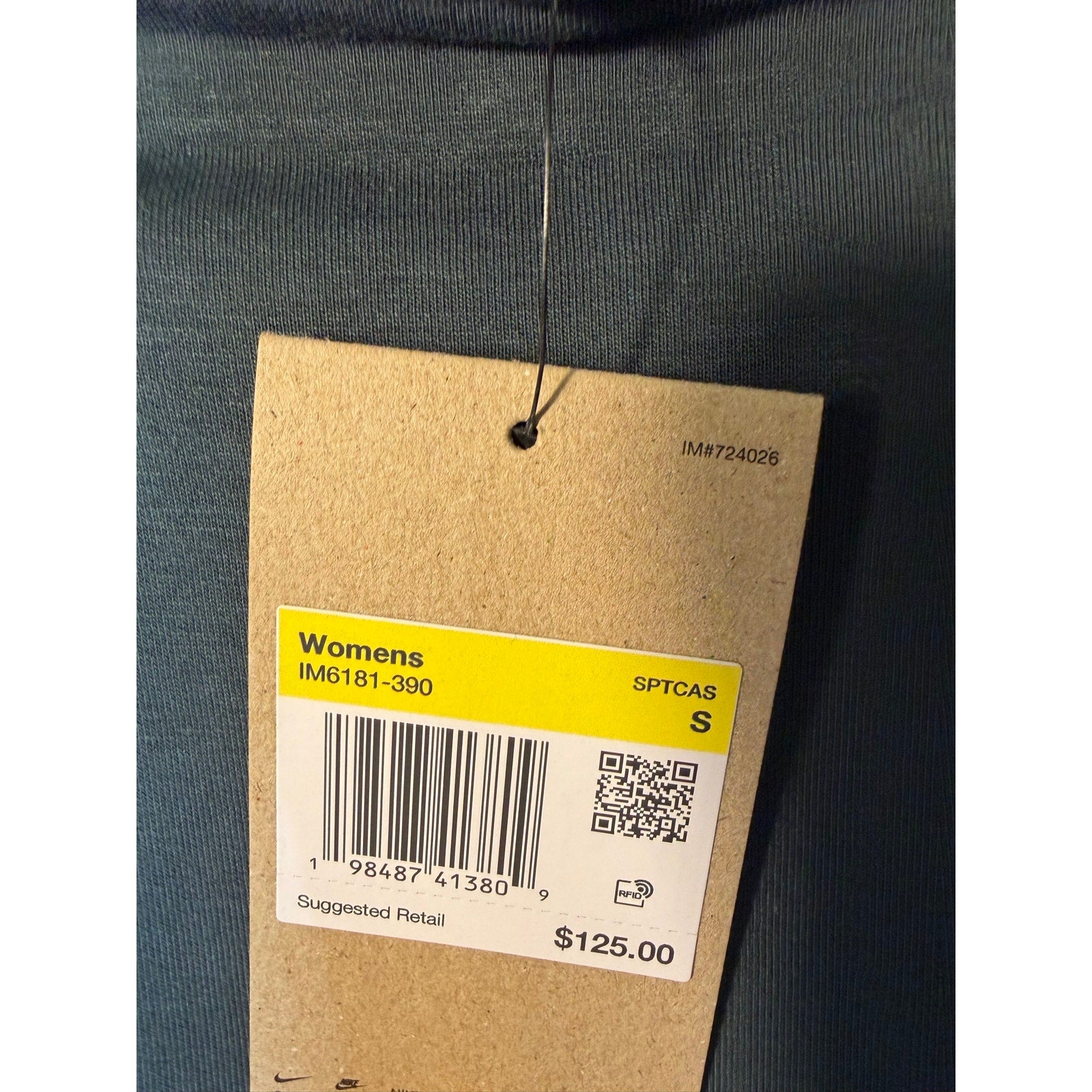 Women's Nike Slim Fit Knee-Length Athletic Skirt in small size, featuring a sleek design and athletic fabric for active wear.