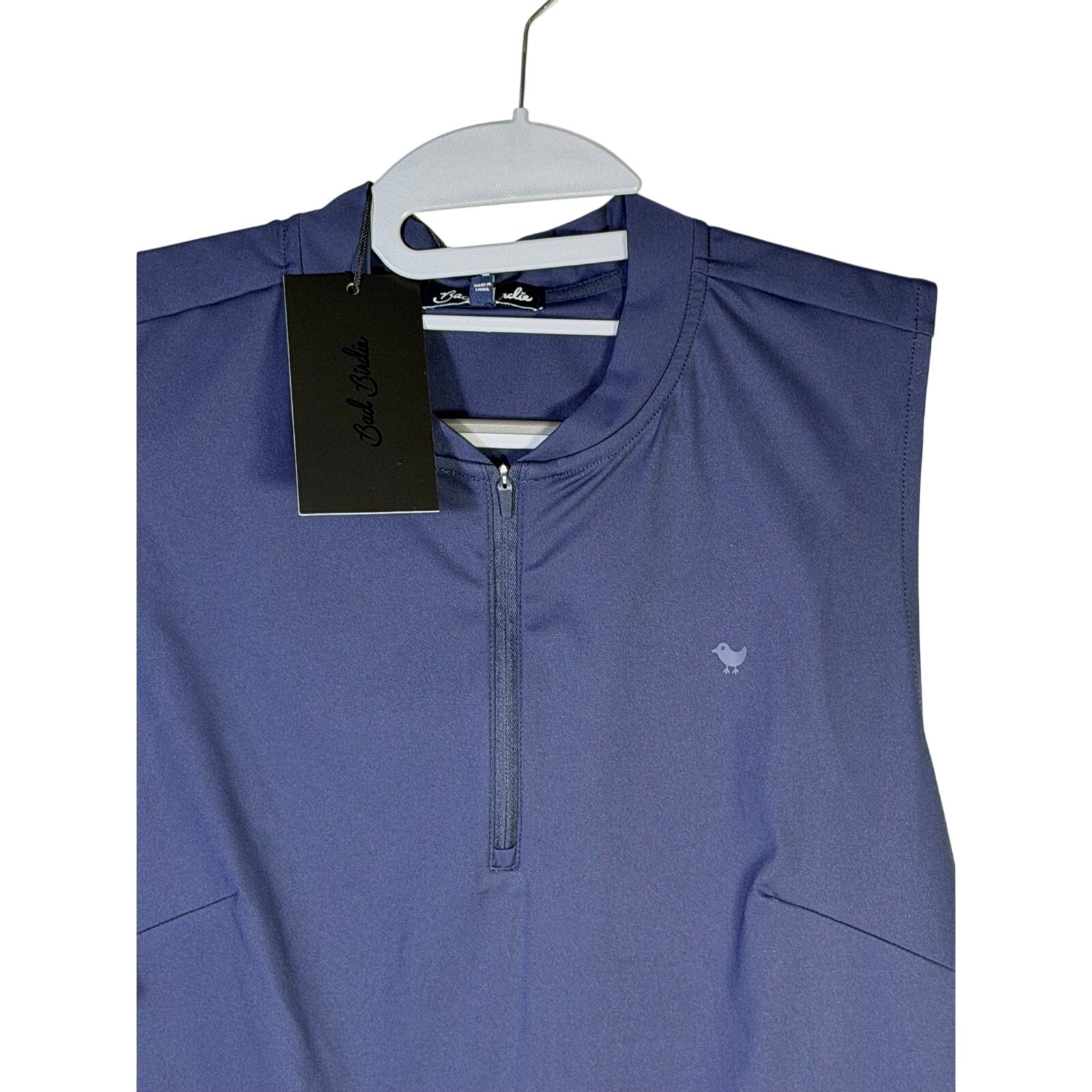 Bad Birdie women's blue sleeveless golf tank top with quarter-zip closure, medium size, casual athletic style.
