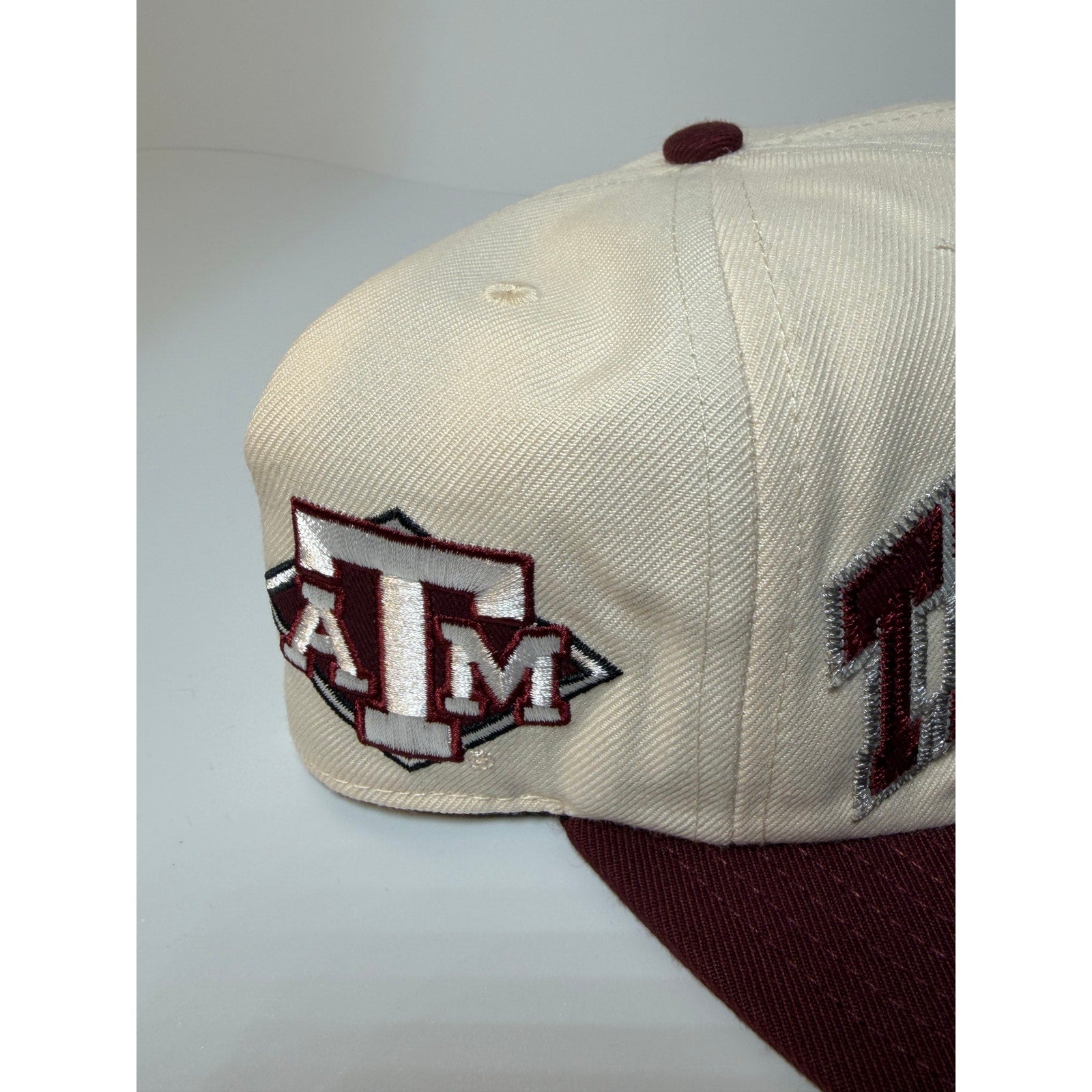 47 Brand Texas A&M Aggies snapback hat in cream and maroon with adjustable strap and team logo on front.