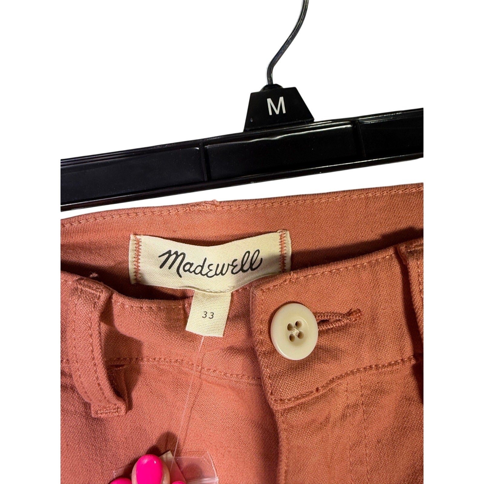 Madewell The Perfect Vintage wide-leg crop pants in terracotta color, size 33, shown on a hanger.