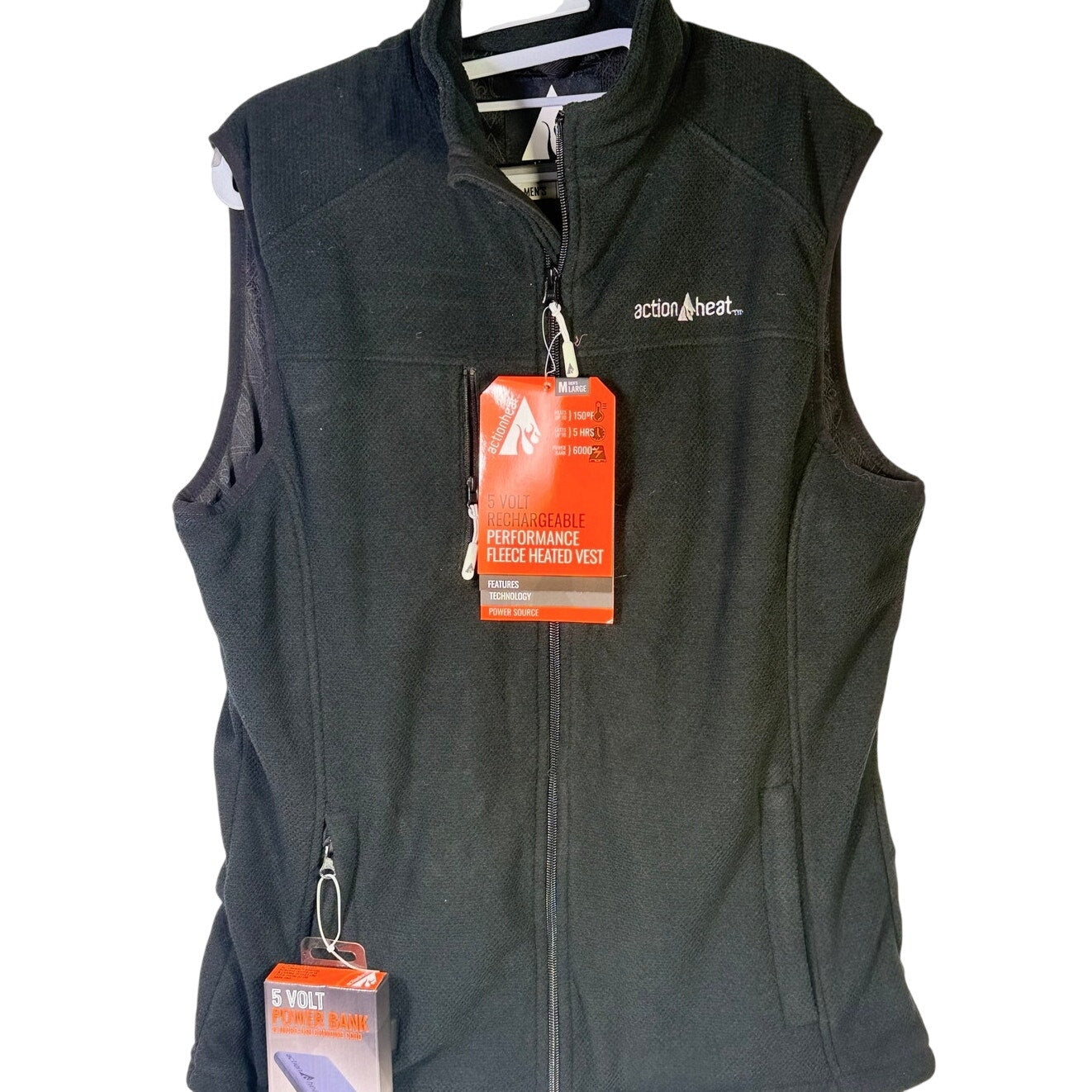 ActionHeat men's black rechargeable heated fleece vest size L with 5V power bank, shown on a hanger.