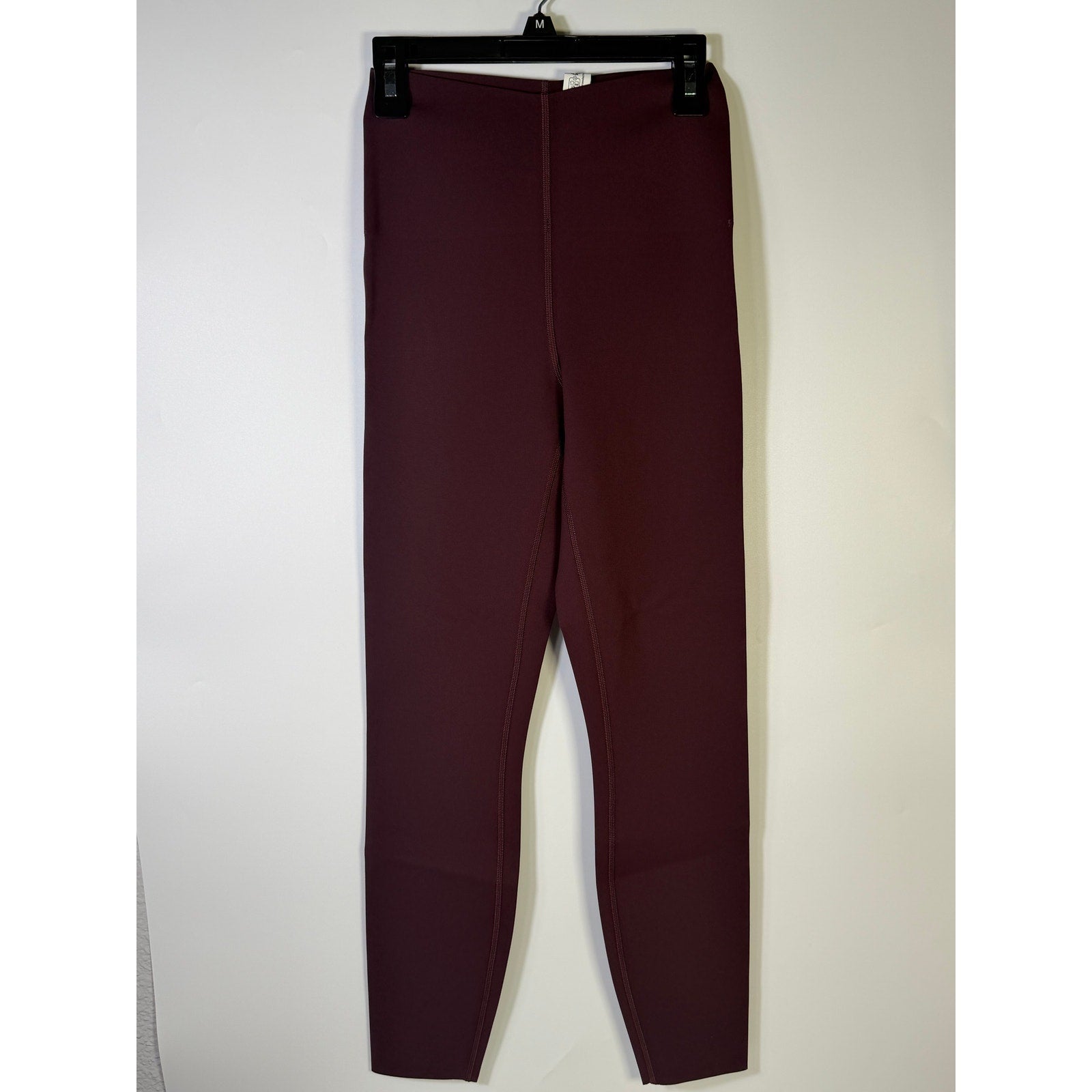 Lululemon Glow Up SHR Tight 25-inch women's leggings in size 4, featuring a sleek fit and glow-enhancing design.