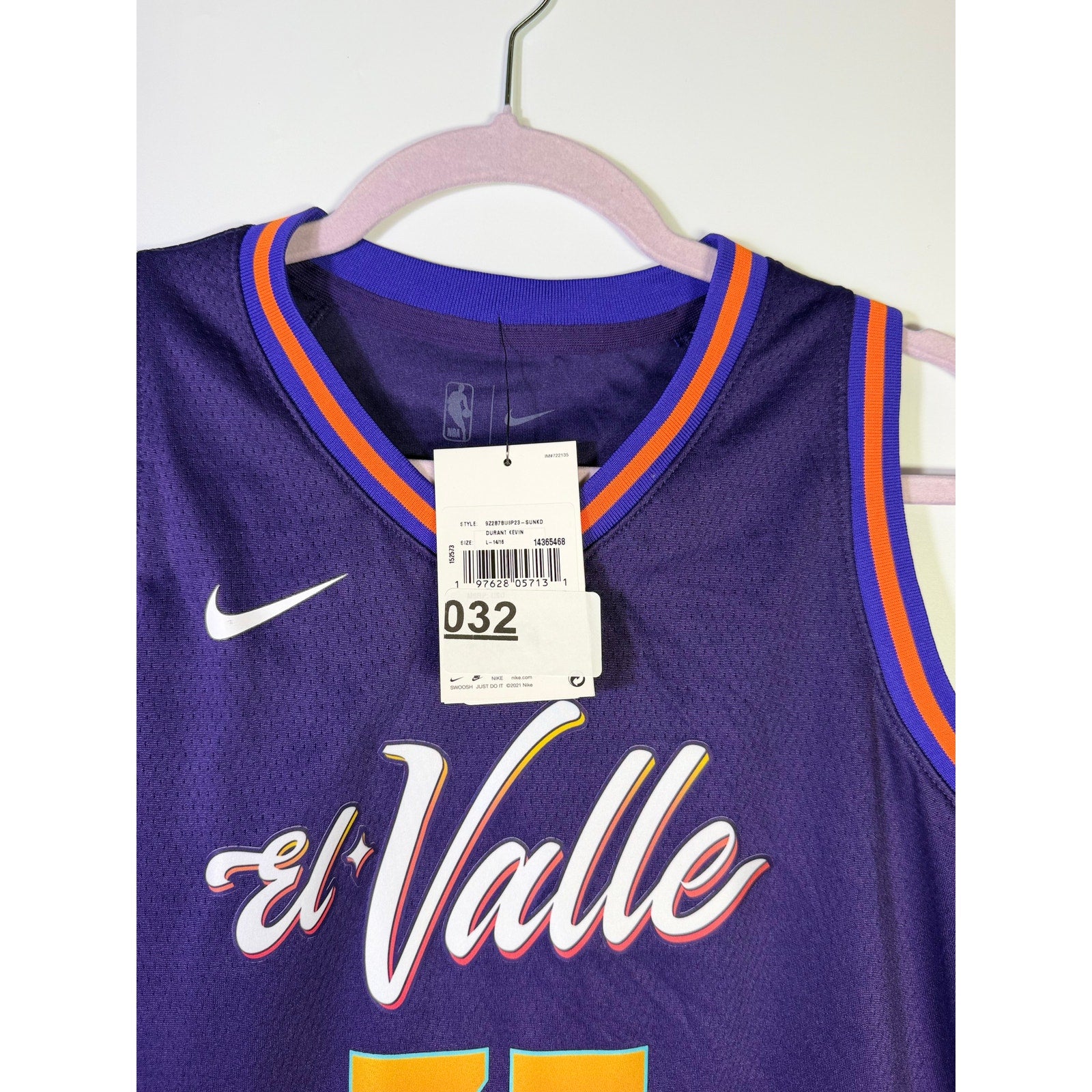 Youth Nike Phoenix Suns Kevin Durant #35 City Edition jersey in size L 14/16, featuring Suns team colors and design.