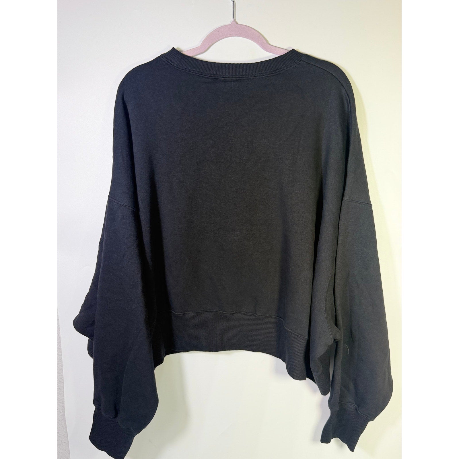 Nike Women’s Colorado Buffaloes oversized black crewneck sweatshirt with team logo, front view, size XL, new with tags