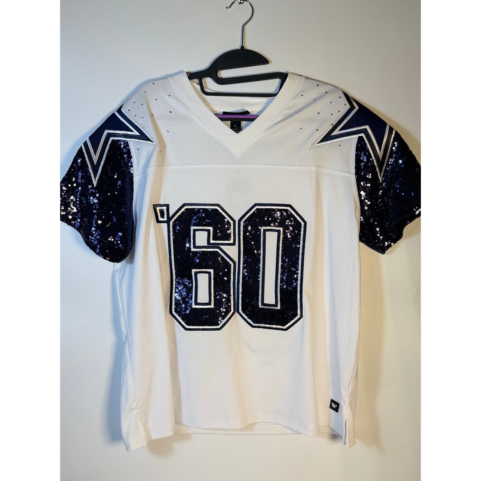 White Dallas Cowboys sequin NFL jersey for women by Wear by Erin Andrews, size large, featuring team logo and sparkling details.