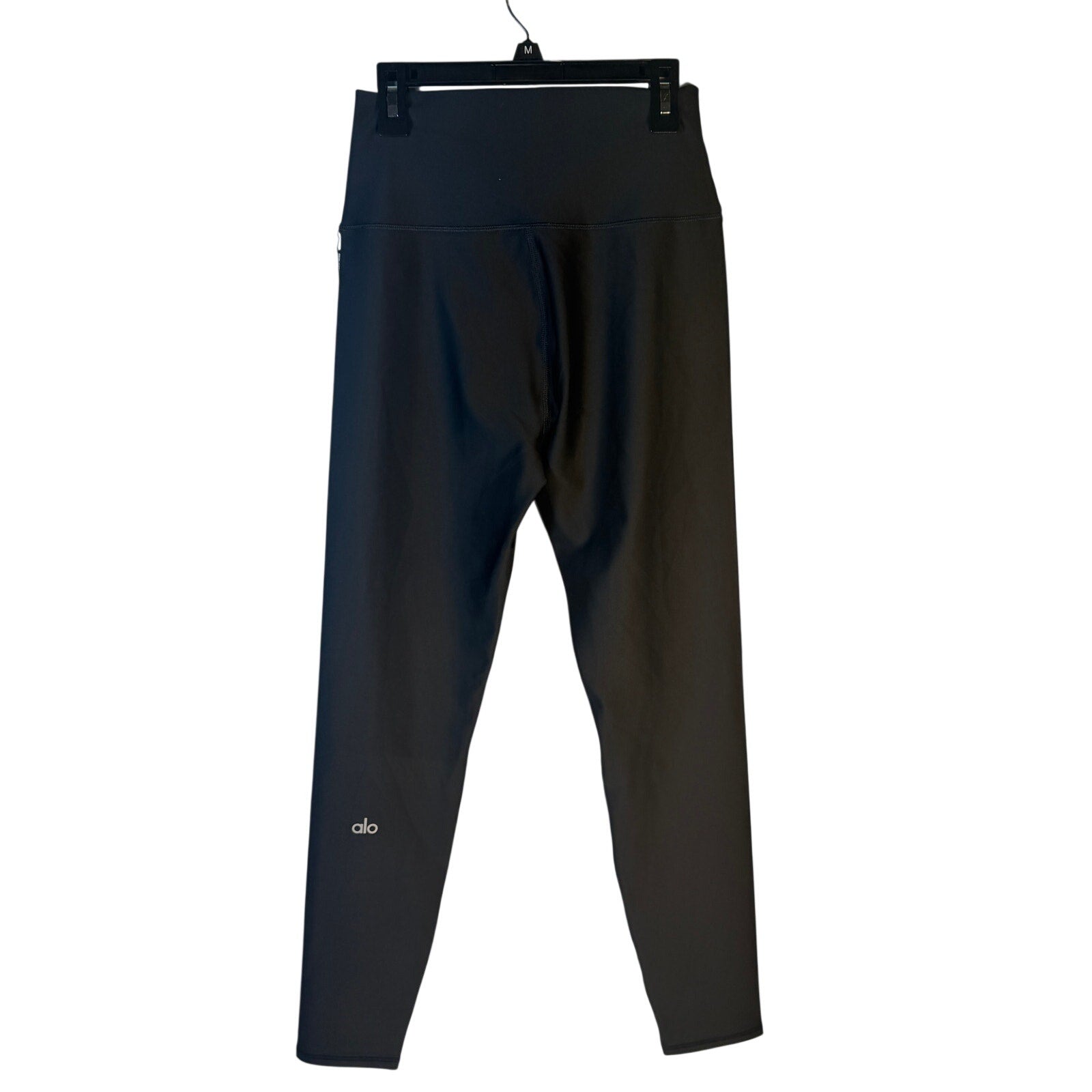 Black Alo Yoga Airlift 7/8 high waist leggings for women, showing the fitted, stretchy fabric and high-rise waistband.