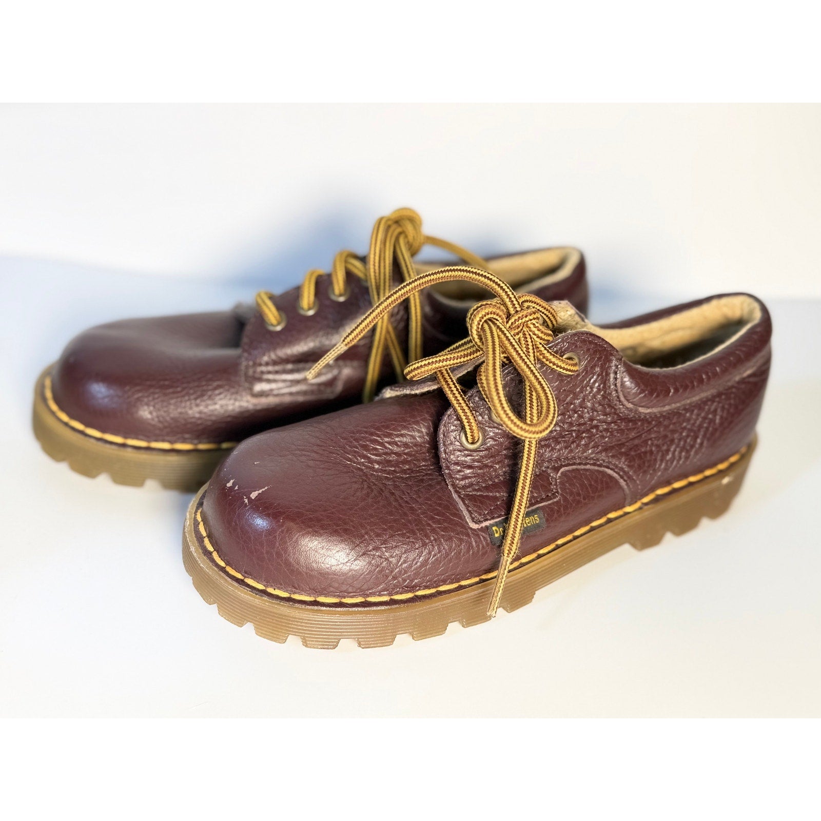Dr. Martens 3-eye Oxford shoes in oxblood leather, UK size 5, showing classic lace-up design and polished finish.