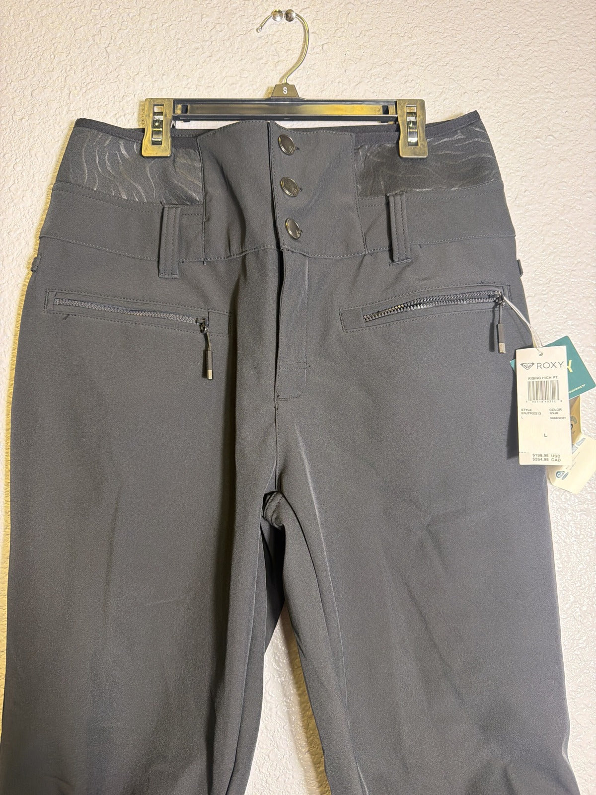 Women's Roxy Rising High Snow Pants in black, high-waist stretch ski pants with reinforced knees, size L, new with tags.