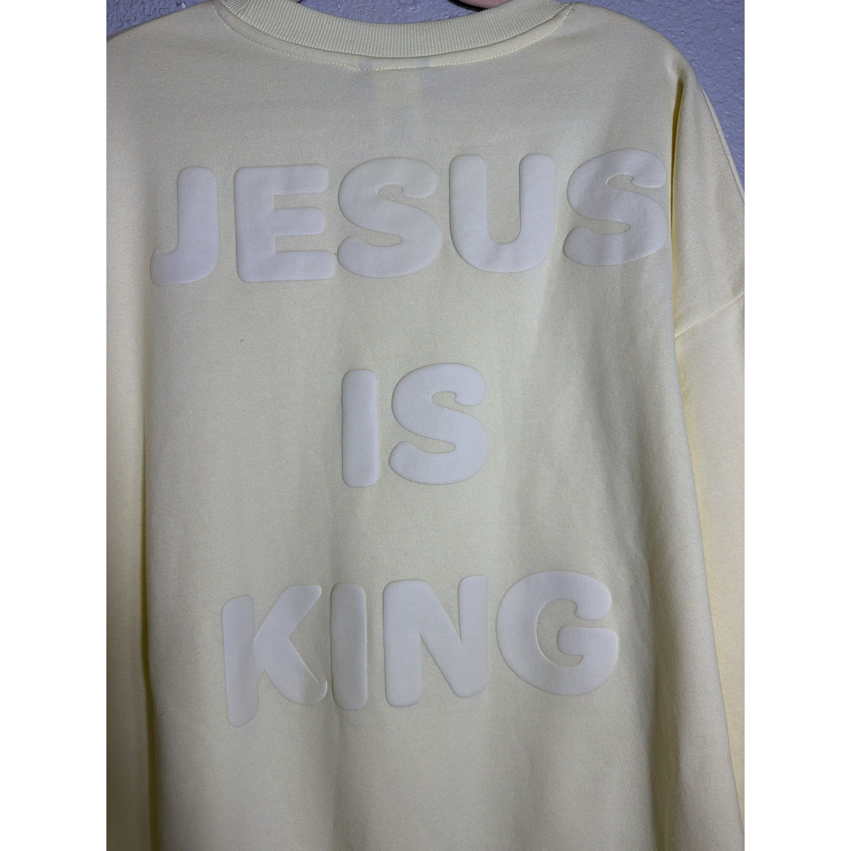 Women's yellow crewneck sweatshirt by Kind Regards featuring Revelation 19:16 and "Jesus Is King" text, new with tags.
