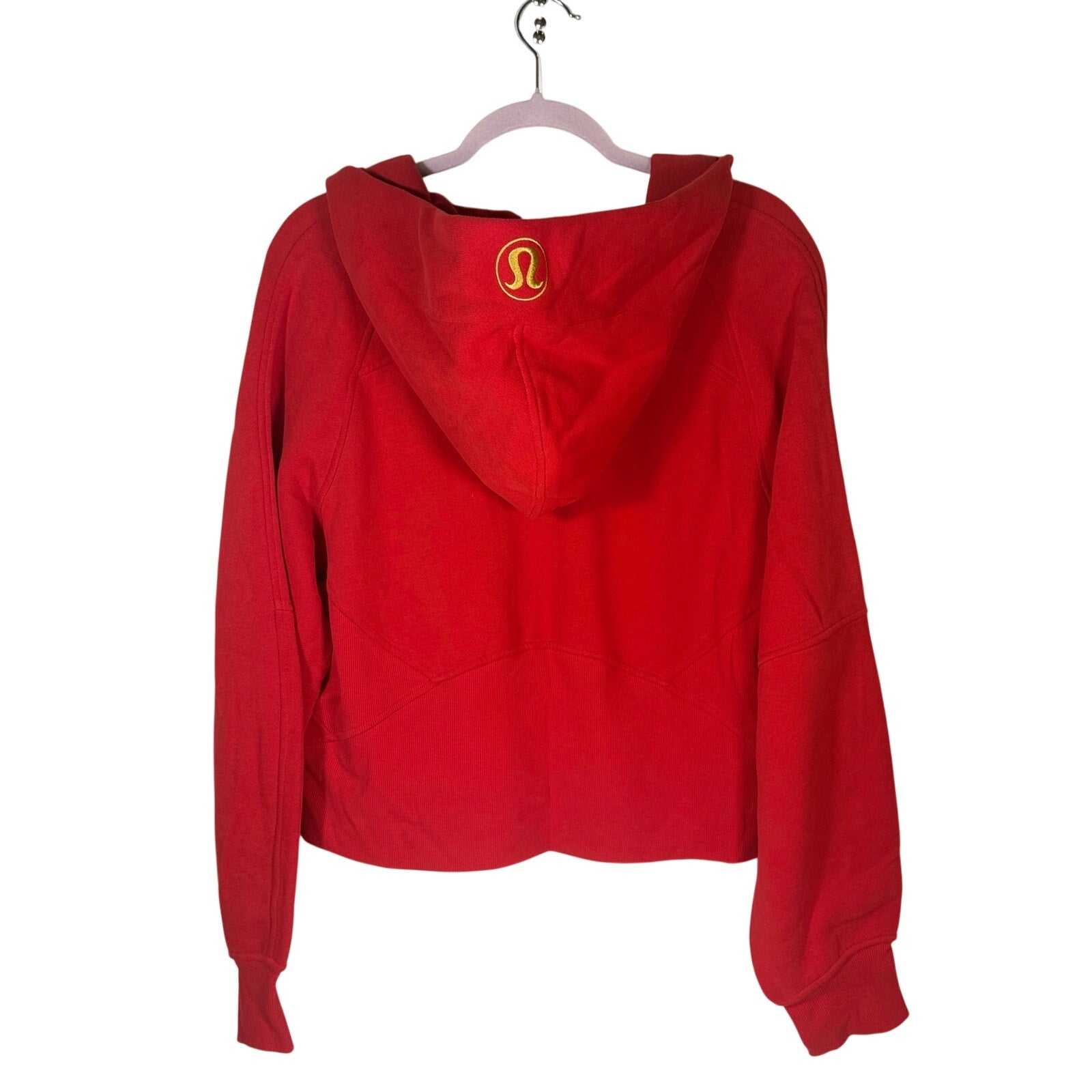 Lululemon women's red scuba oversized full zip hoodie in size M/L, showing front view with gold accents and relaxed fit.