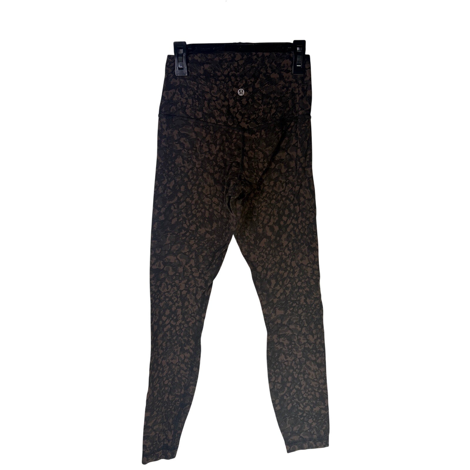 Lululemon women's Align high-rise leggings in brown and black camouflage, 25-inch length, size 4, shown on a model.