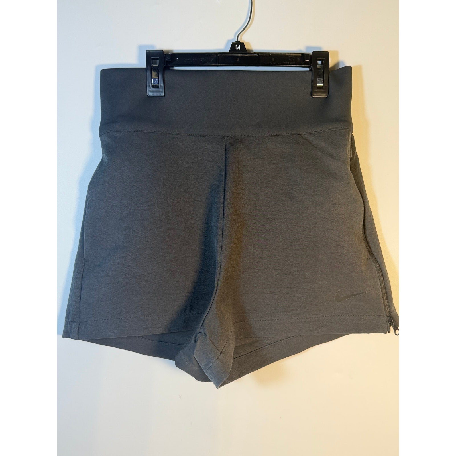 Nike Dri-FIT Flex Bliss Luxe women's shorts in gray, high-rise design, perfect for running and athletic wear.