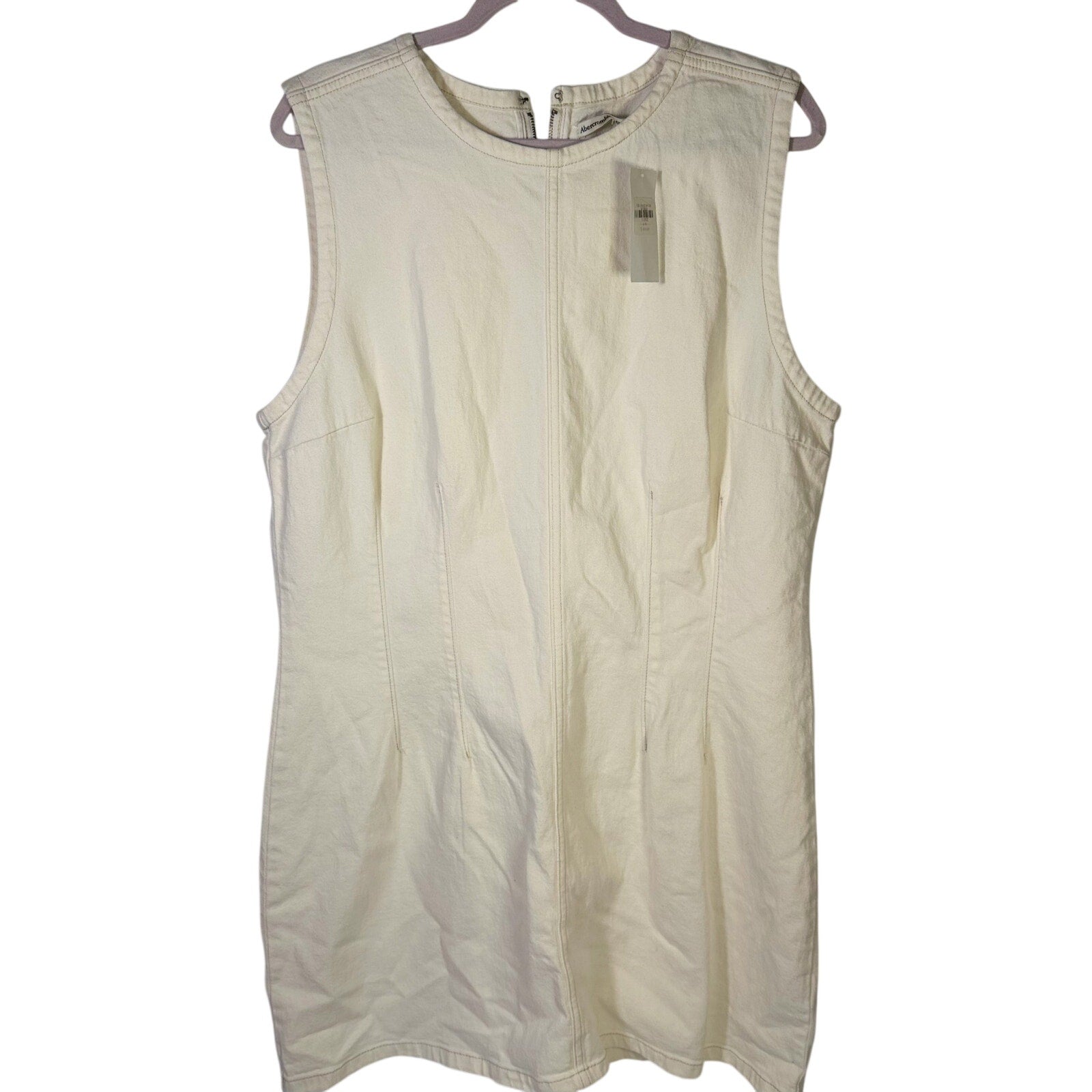 Abercrombie & Fitch cream denim mini shift dress in size XL, featuring a sleeveless style and classic denim fabric.