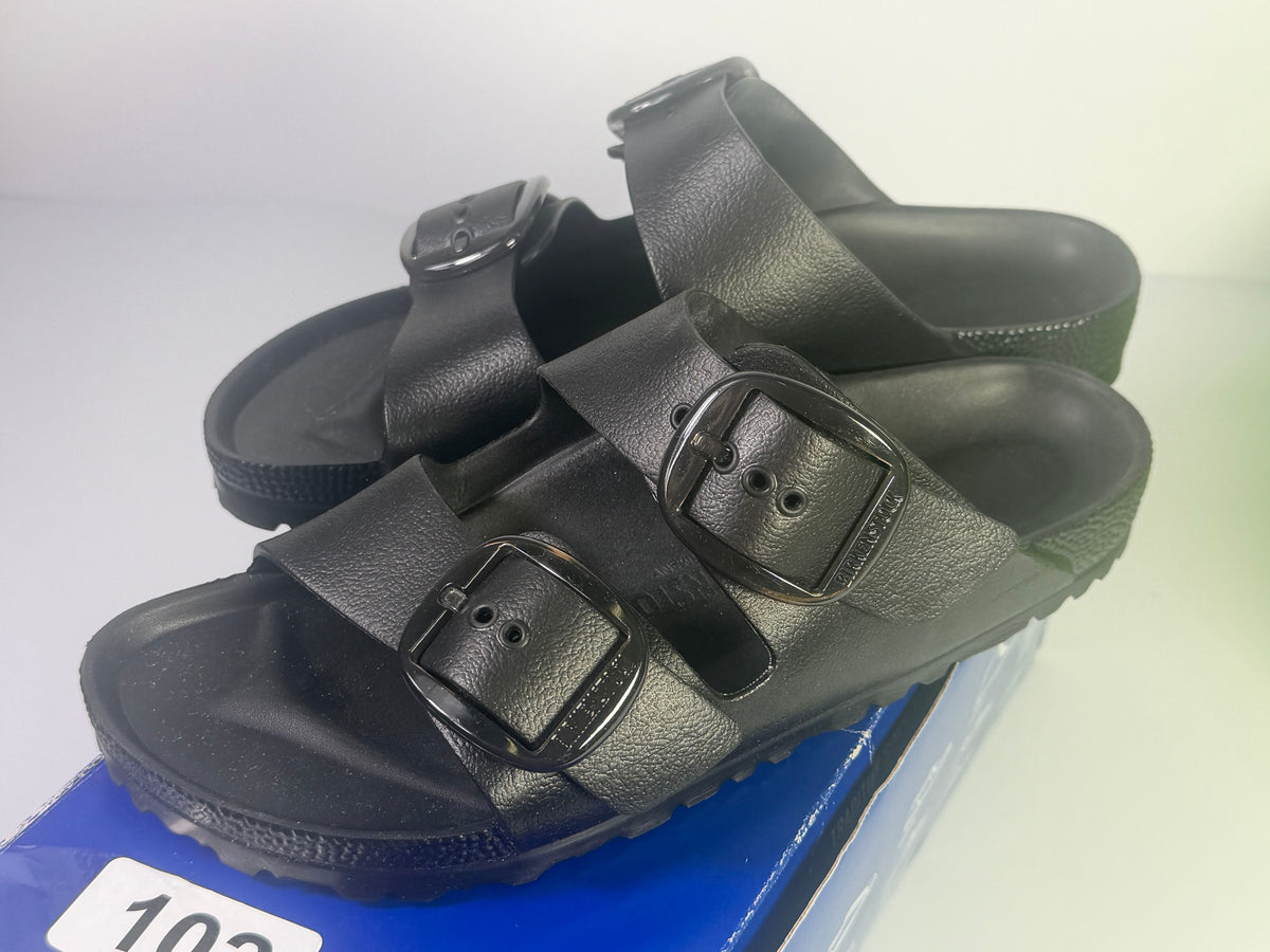 Black Birkenstock Arizona Big Buckle EVA sandals for women, US 7 / EU 38, narrow fit, with wide straps and buckle details.