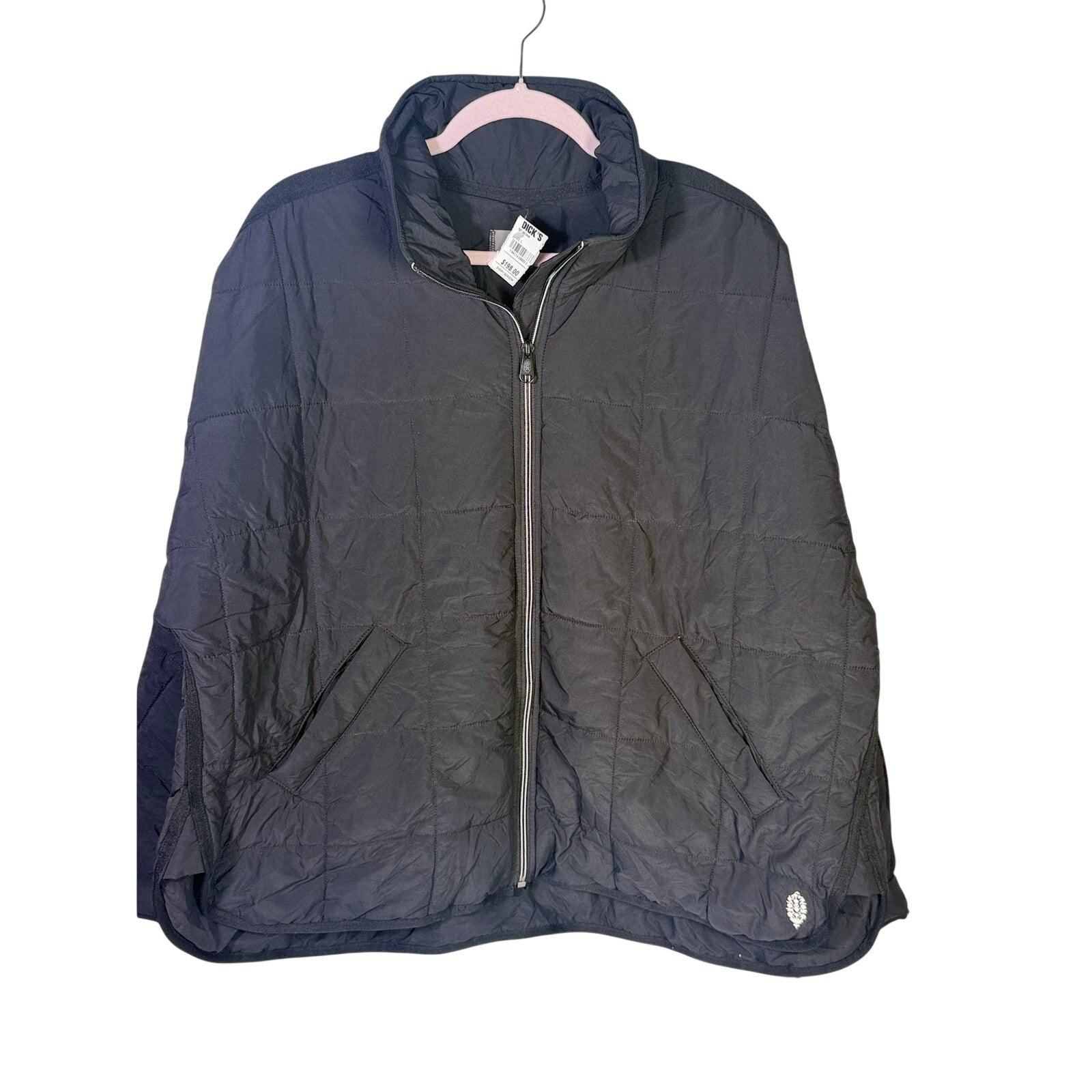 Black quilted Free People Movement women's full zip jacket in size large, shown with front view and zip closure.