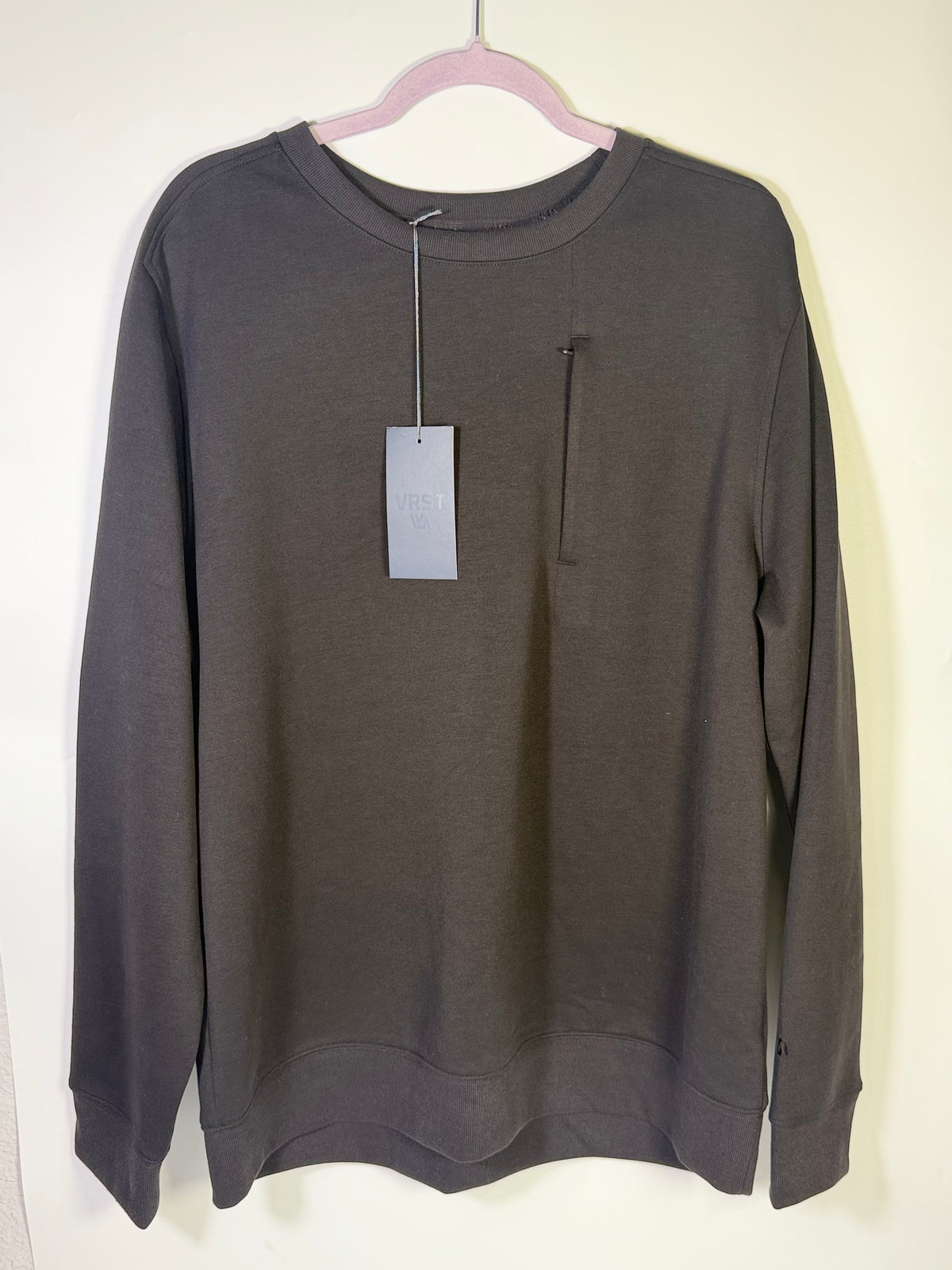 Men's VRST Tech Fleece Crewneck Sweatshirt in grey and black, men's XXL, shown on a hanger with a close-up of the fabric.