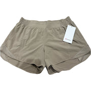Lululemon Hotty Hot high-rise lined running shorts in tan beige for women, size 14, with a 4-inch inseam and comfortable fit.