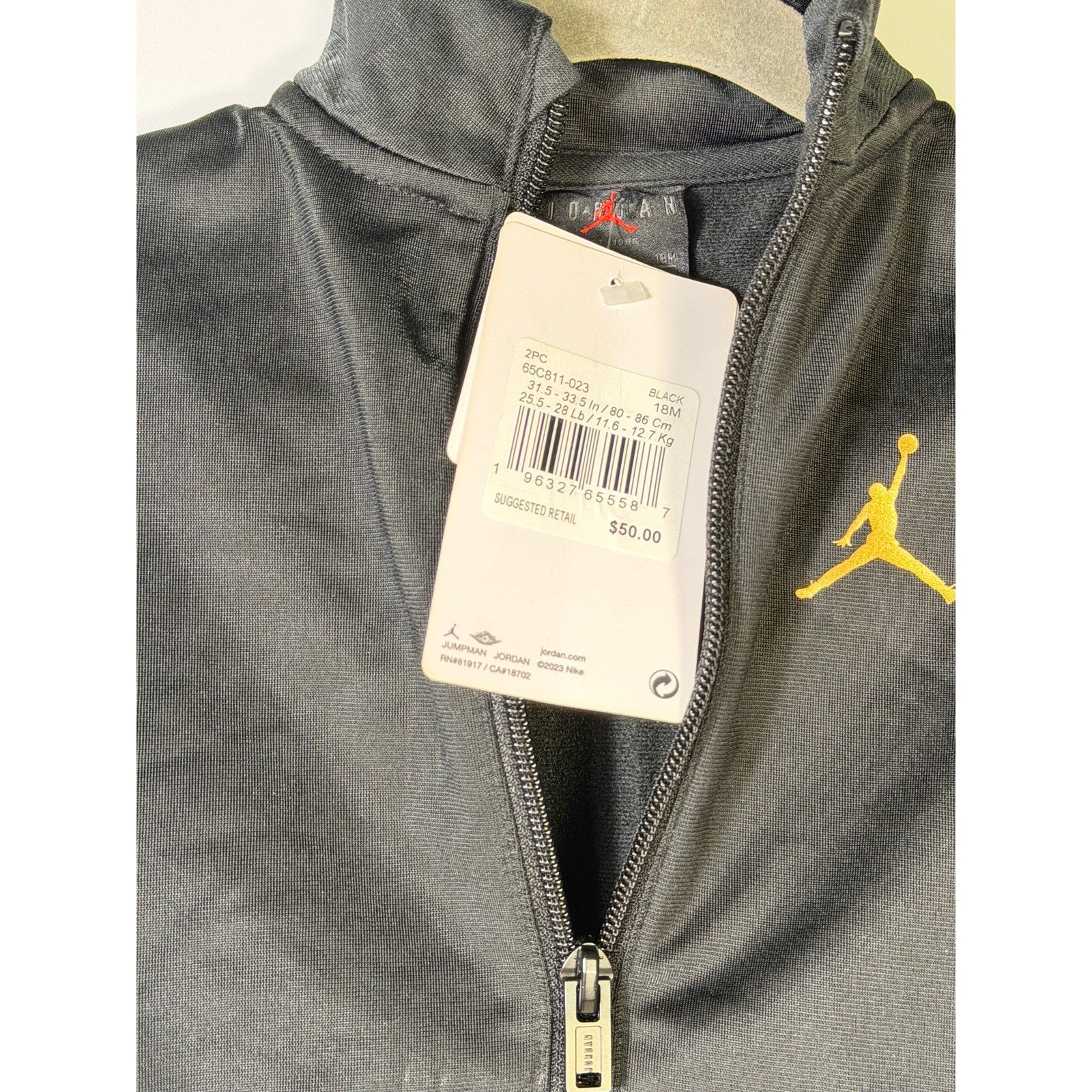 Jordan baby boys 2-piece black and gold track jacket and jogger set, size 18 months, new with tags, casual athletic clothing.