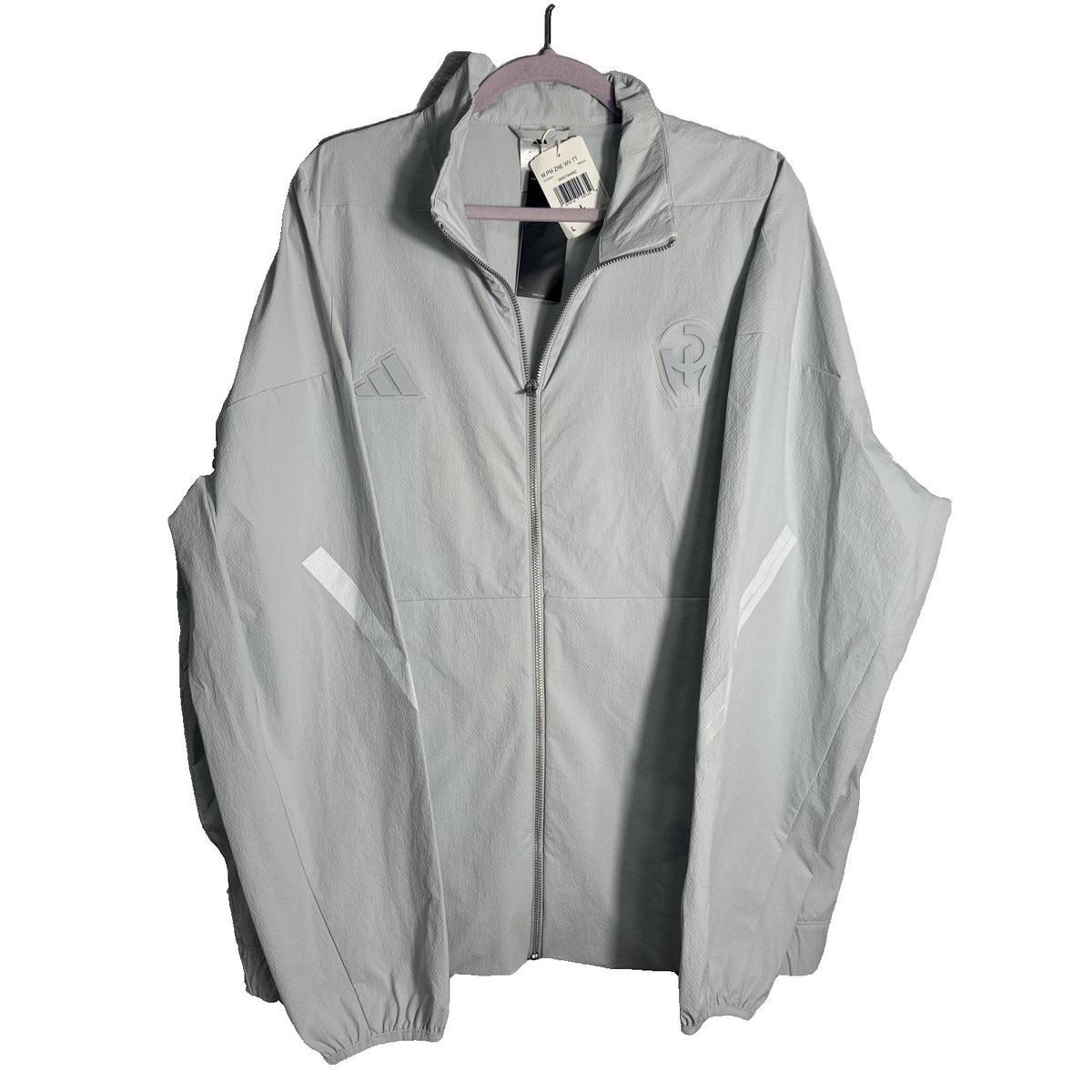 Men's adidas Patrick Mahomes Z.N.E. woven track jacket in clear grey, featuring a lightweight design and athletic fit.