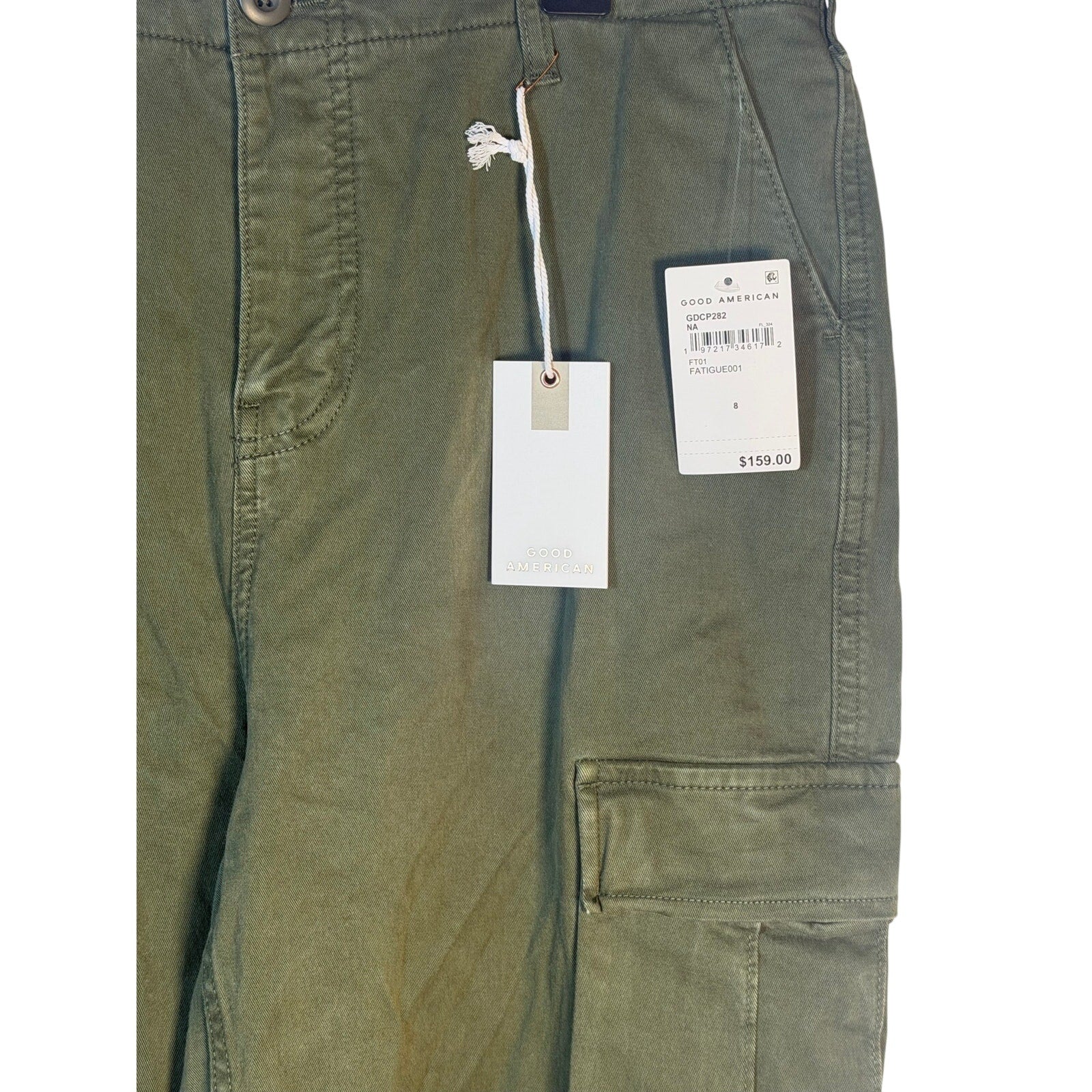 Olive green Good American fatigue cargo pants in size 8, front view showing pockets and relaxed fit.