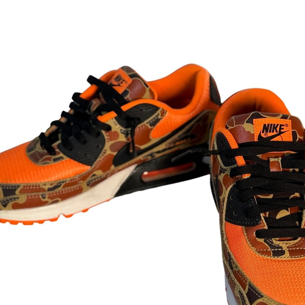 Nike Air Max 90 orange camo and black sneakers for men, size 11, featuring a bold camo pattern and sporty design.