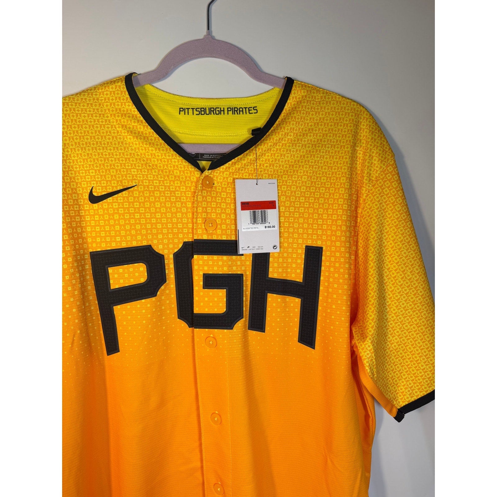 Nike Pittsburgh Pirates City Connect MLB jersey for men in large size, featuring gold design and team logo.