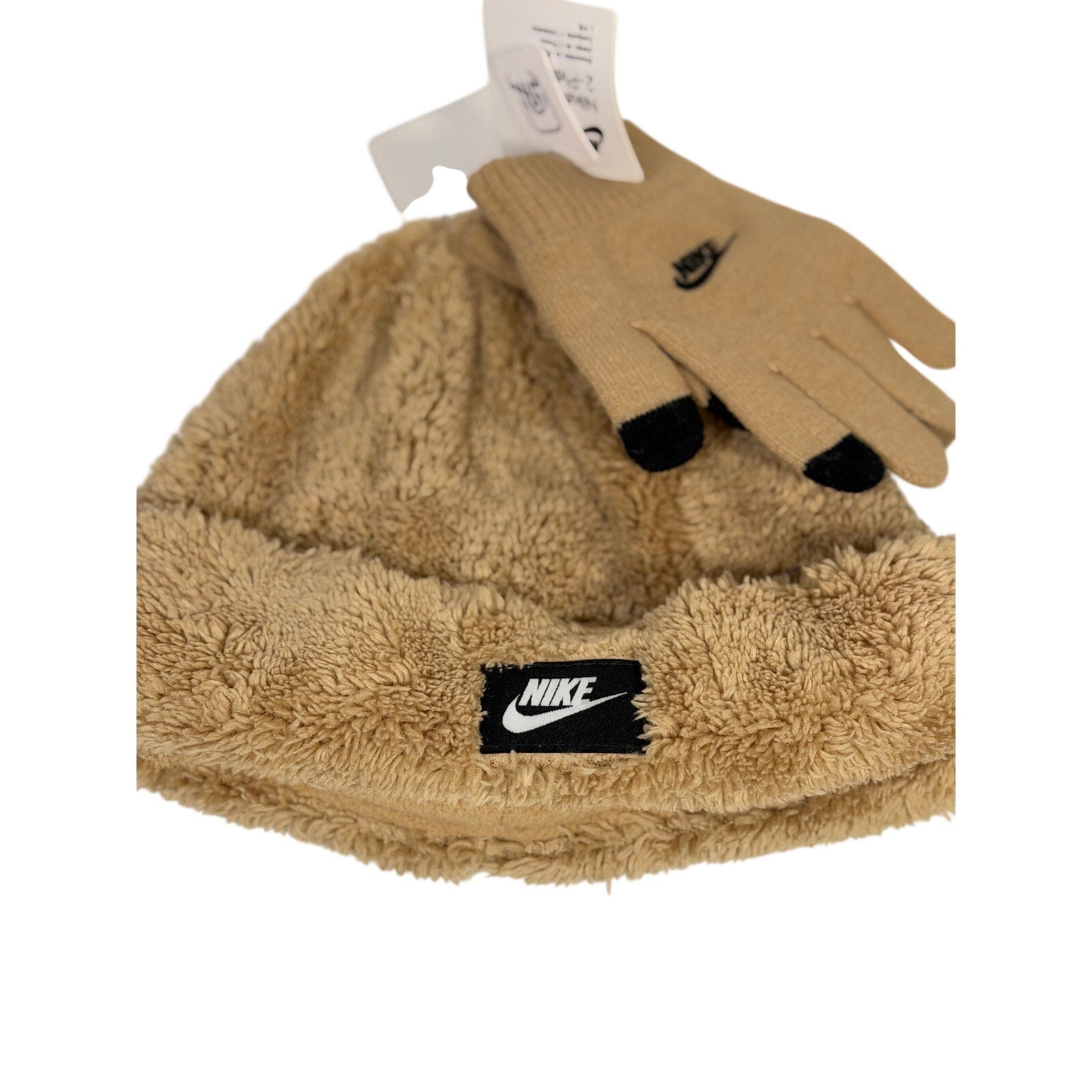 Nike tan Sherpa neck warmer and touchscreen gloves 2-piece set, featuring a cozy hat and warm accessories for cold weather.