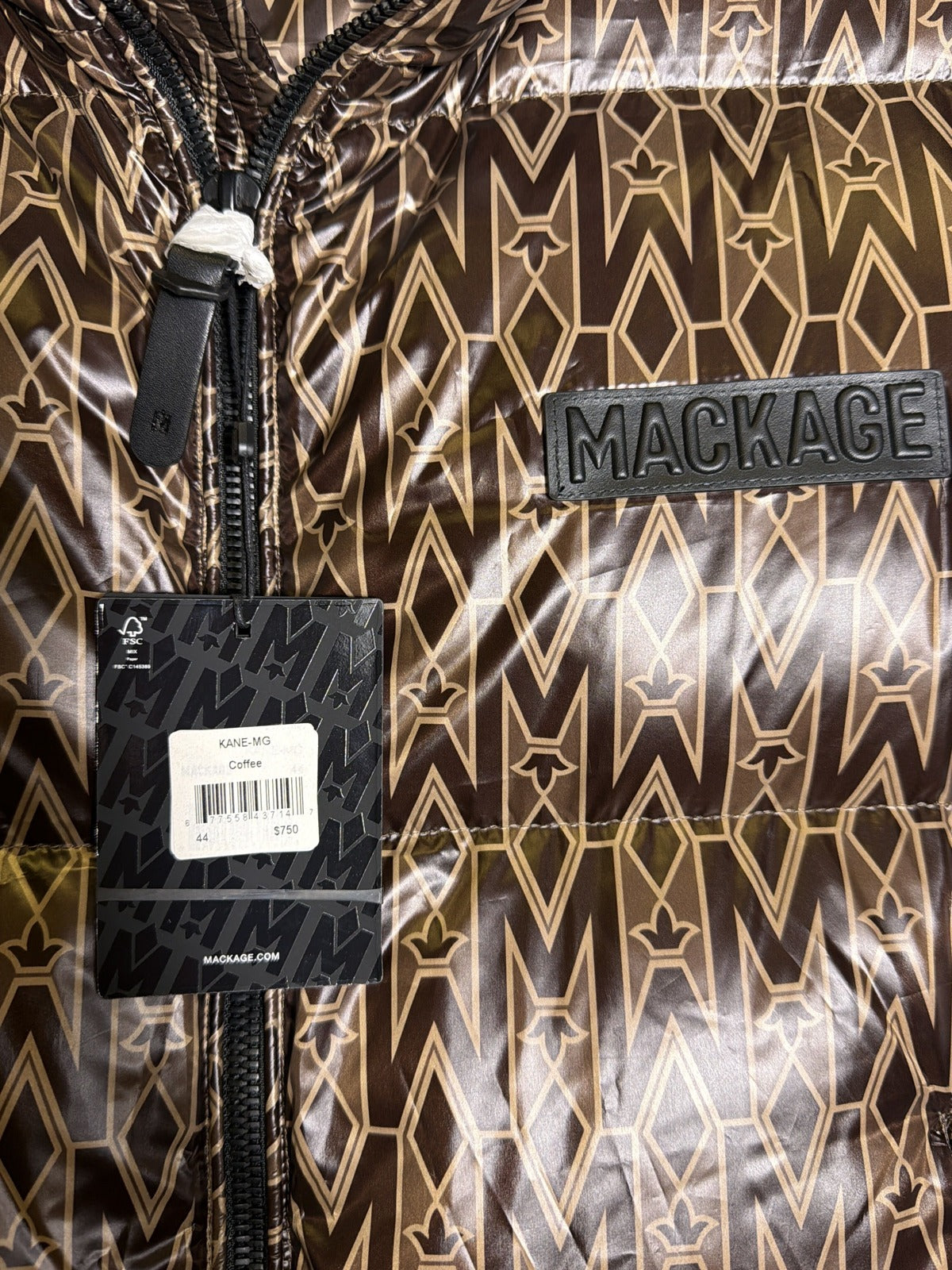 Mackage Kane-MG monogram down puffer vest in coffee brown, men's size XL, displayed on a hanger against a plain background.