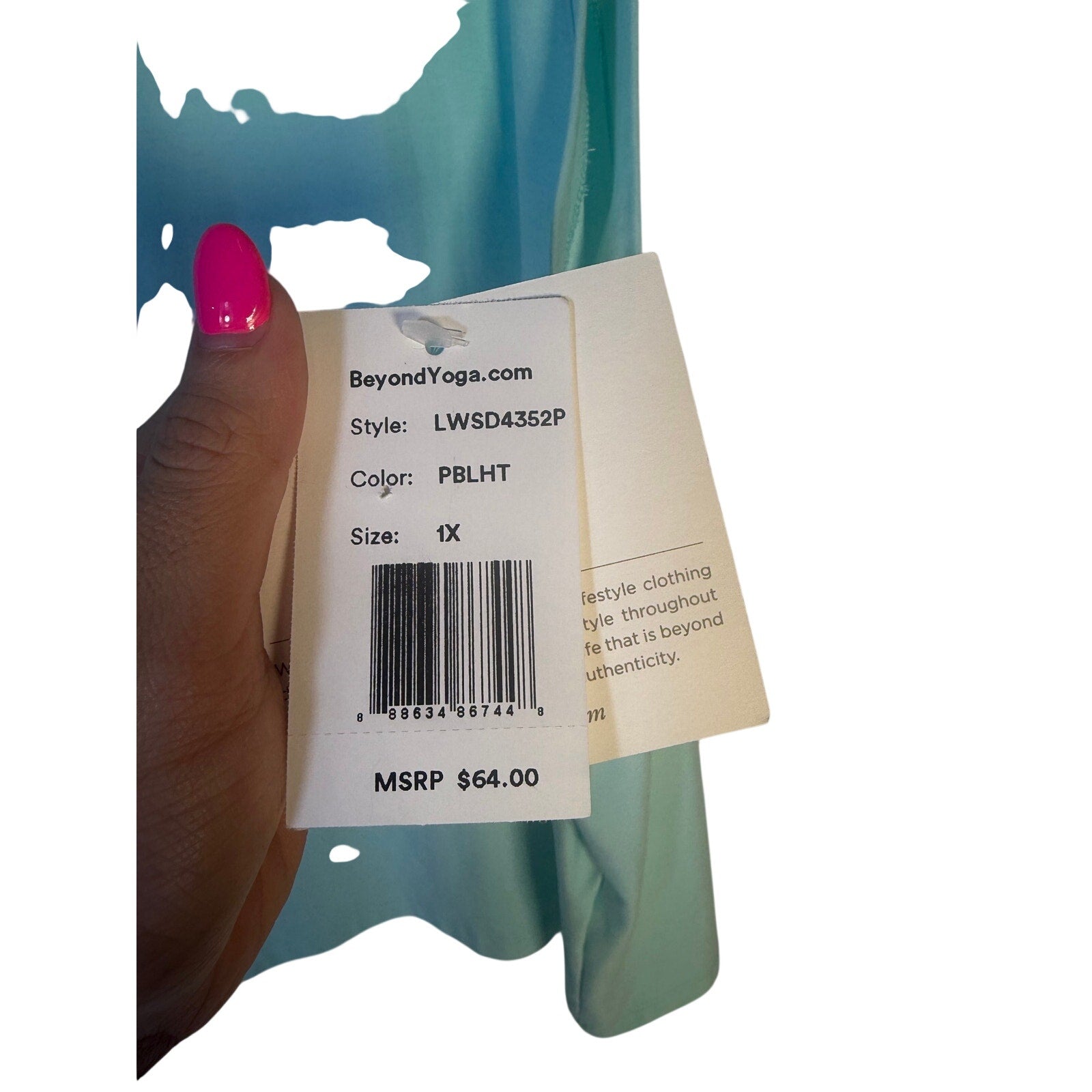 Beyond Yoga women's green sleeveless tank top, front view showing soft fabric and relaxed fit, size 1X, new with tags.
