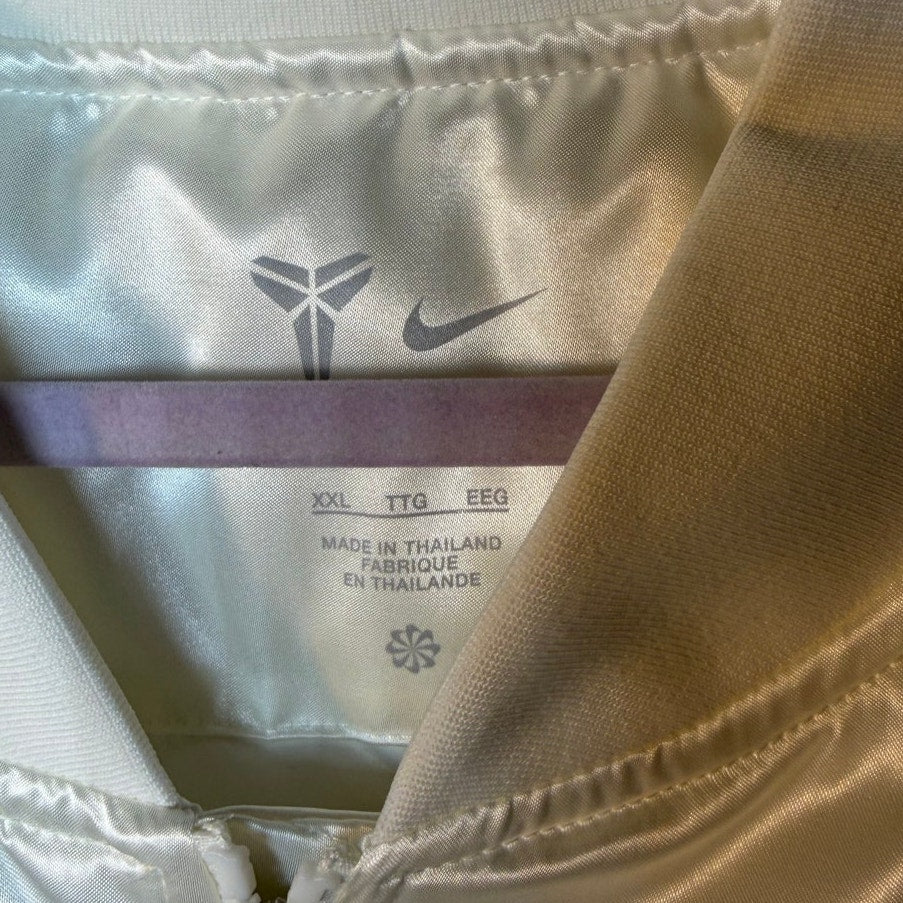 Nike Kobe Year of the Mamba insulated men's white jacket, XXL size, with puffy design and Nike branding visible.