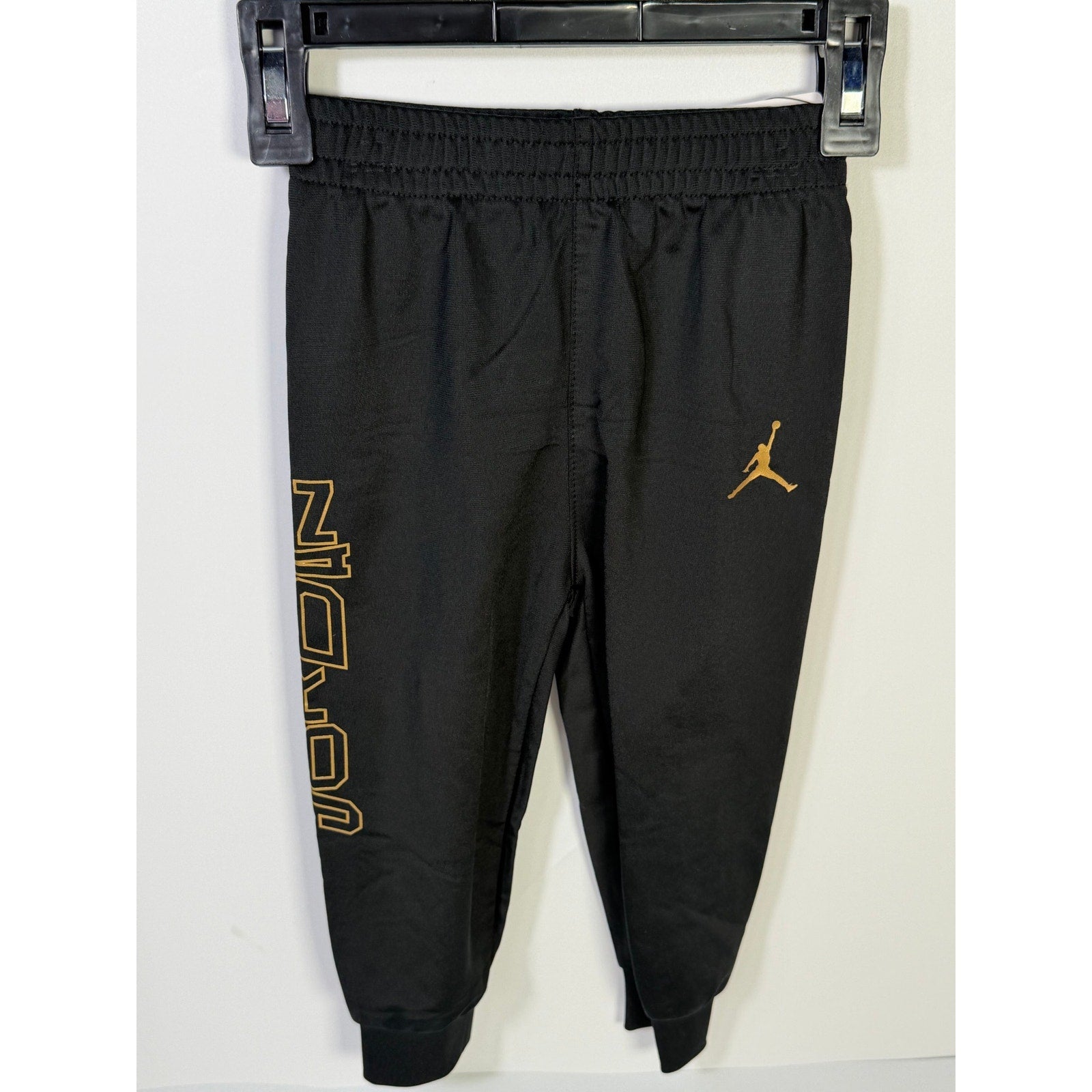 Jordan baby boys 2-piece black and gold track jacket and jogger set, size 18 months, new with tags.
