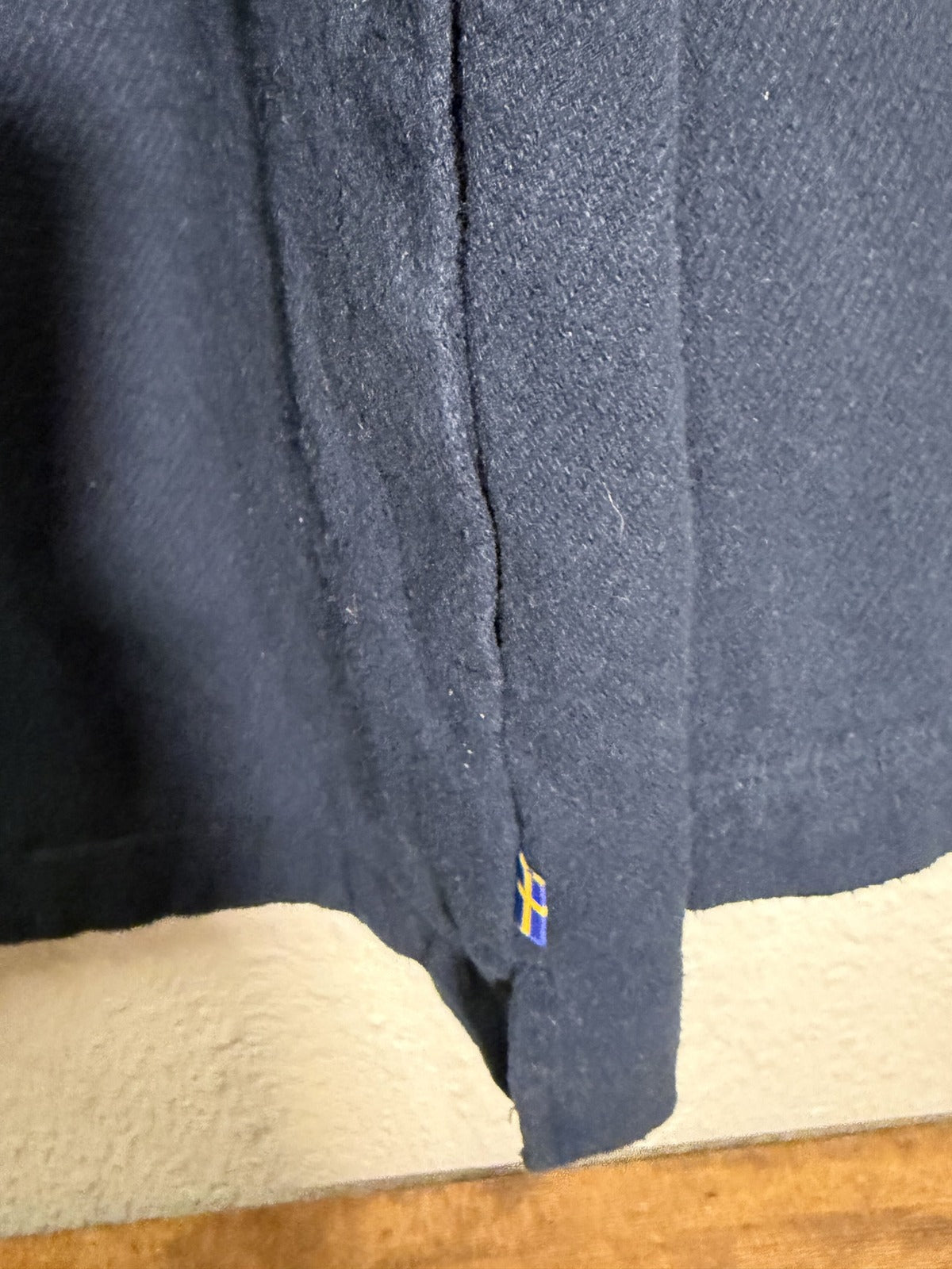 Fjällräven Singi Flannel Overshirt Shacket for women in dark navy, shown as a casual jacket with button front and plaid pattern.