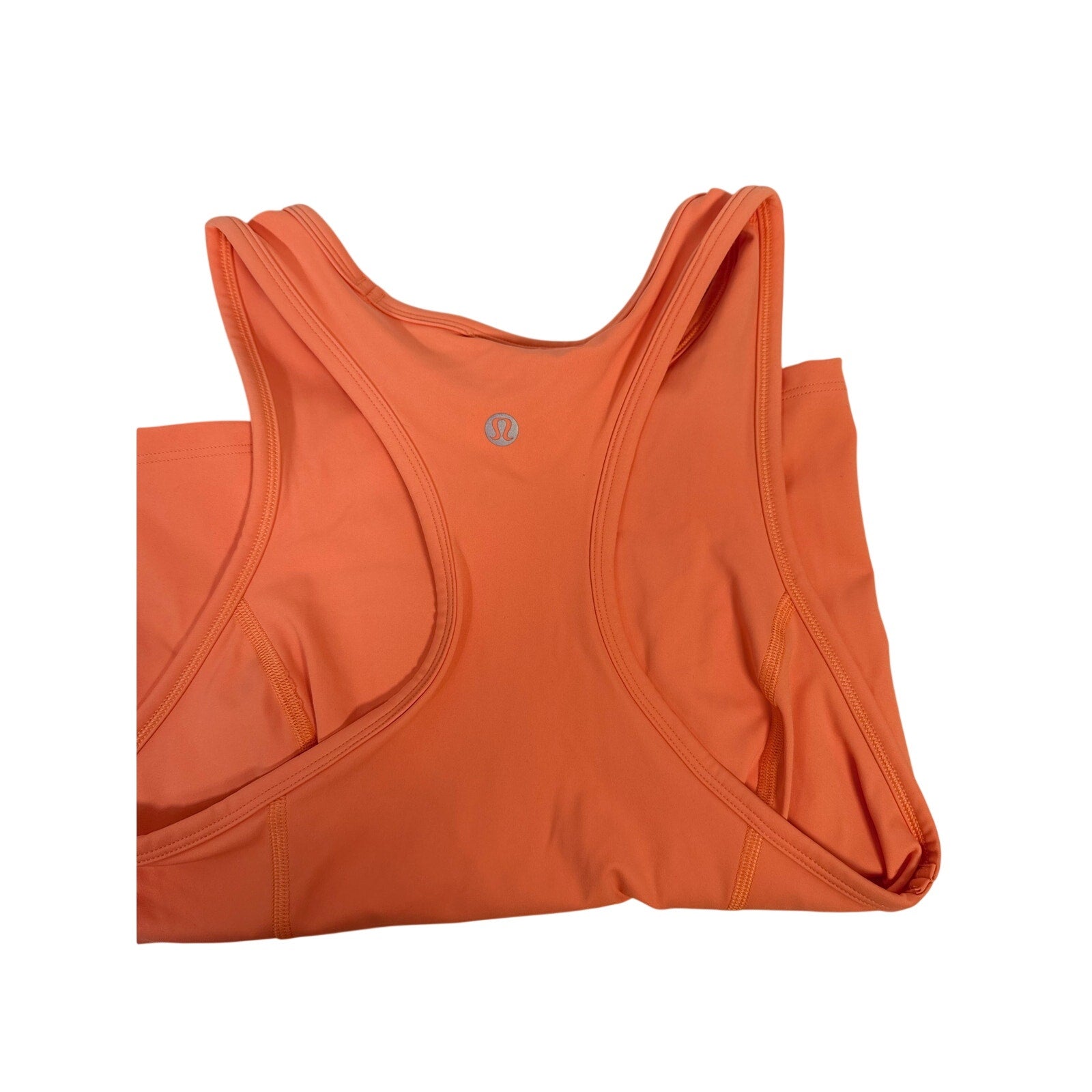 Lululemon Nulu Racerback Cropped Run Tank Top for women in coral color, size 4, lightweight athletic tank top.