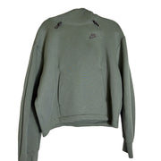 Nike Sportswear Tech Fleece women's oversized cropped hoodie in green, size XS, featuring a relaxed fit and fleece fabric.
