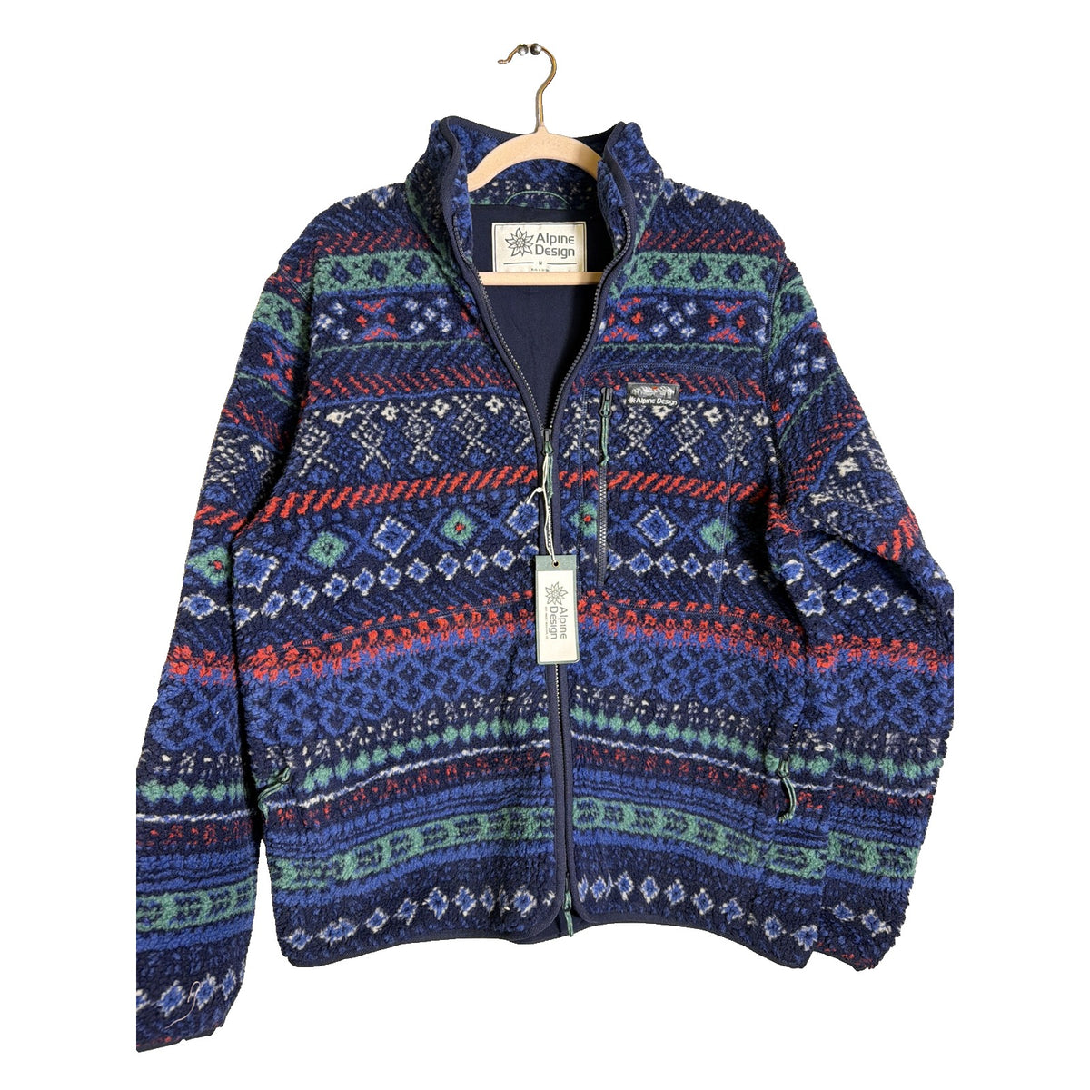 Alpine Design men's Sherpa full zip fleece jacket in deep navy with Fair Isle pattern, displayed on a hanger.