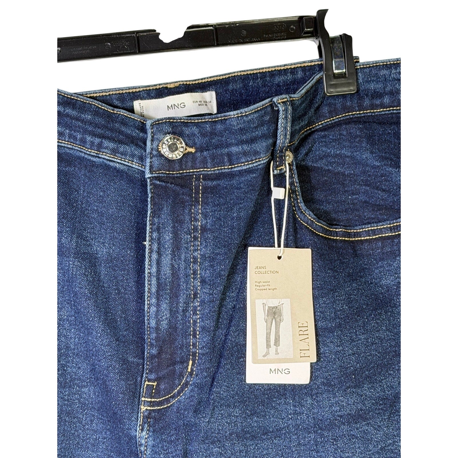 MNG women's medium wash straight leg jeans in size 16, displayed on a hanger with visible pockets and classic denim details.