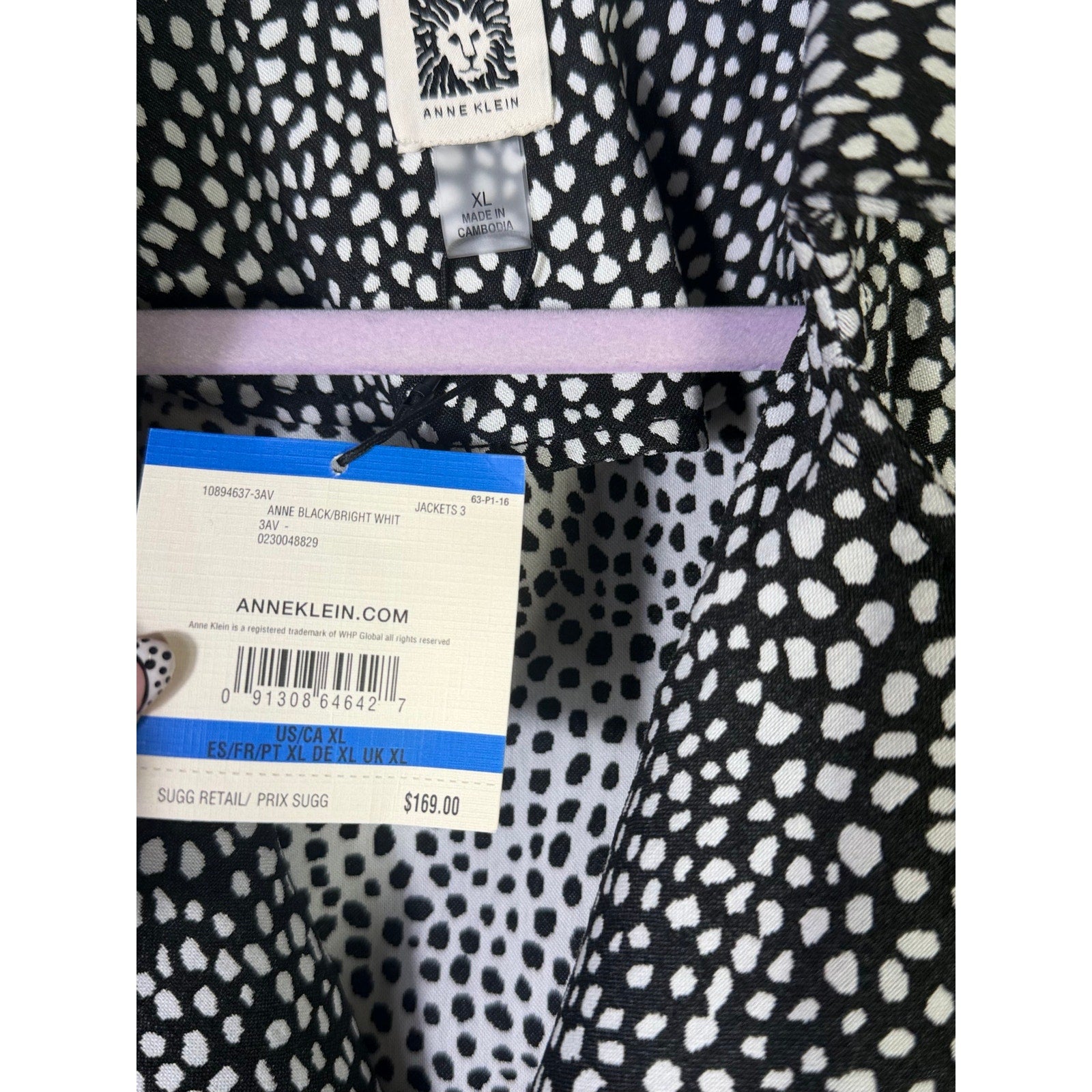 Anne Klein women’s black and white animal print blazer jacket with tailored fit, size XL, shown on a hanger.