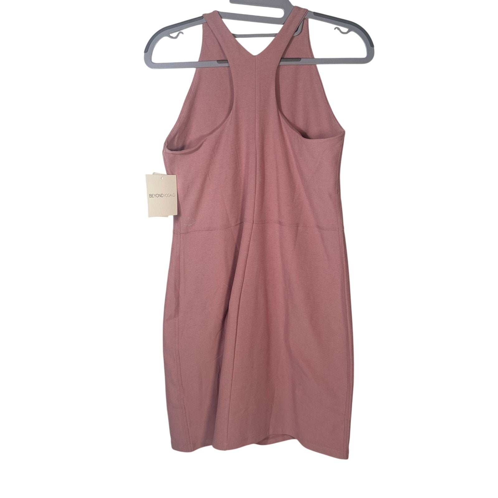 Beyond Yoga women's dusty rose racerback midi tank dress, size M, shown on a hanger with a close-up of fabric texture.