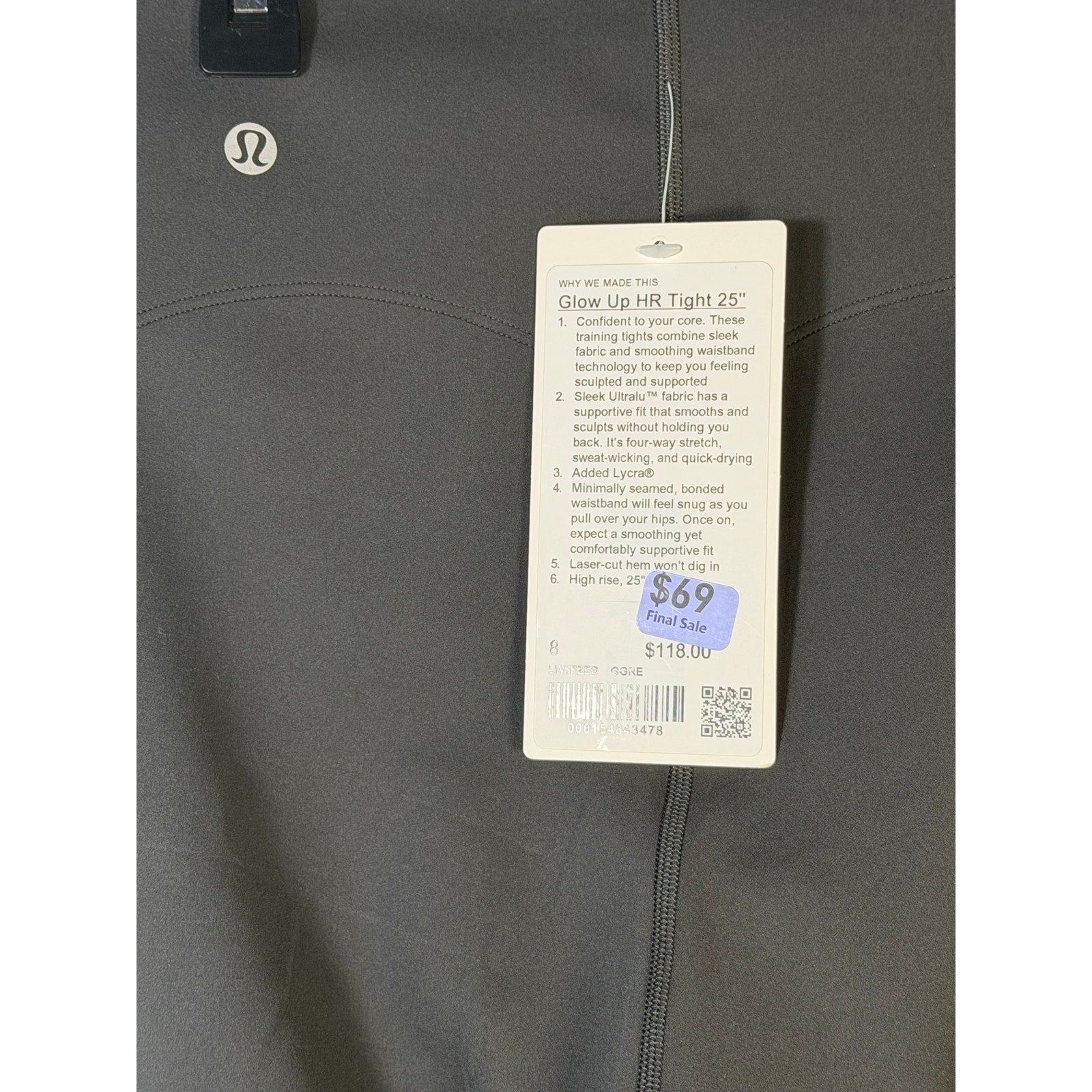 Lululemon Glow Up high-rise leggings in graphite grey, size 8, made of stretchy, form-fitting athletic fabric.