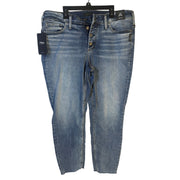 Silver Jeans Co. Suki curvy fit mid-rise skinny crop jeans for women, size 14W, shown on a model with a light wash finish.