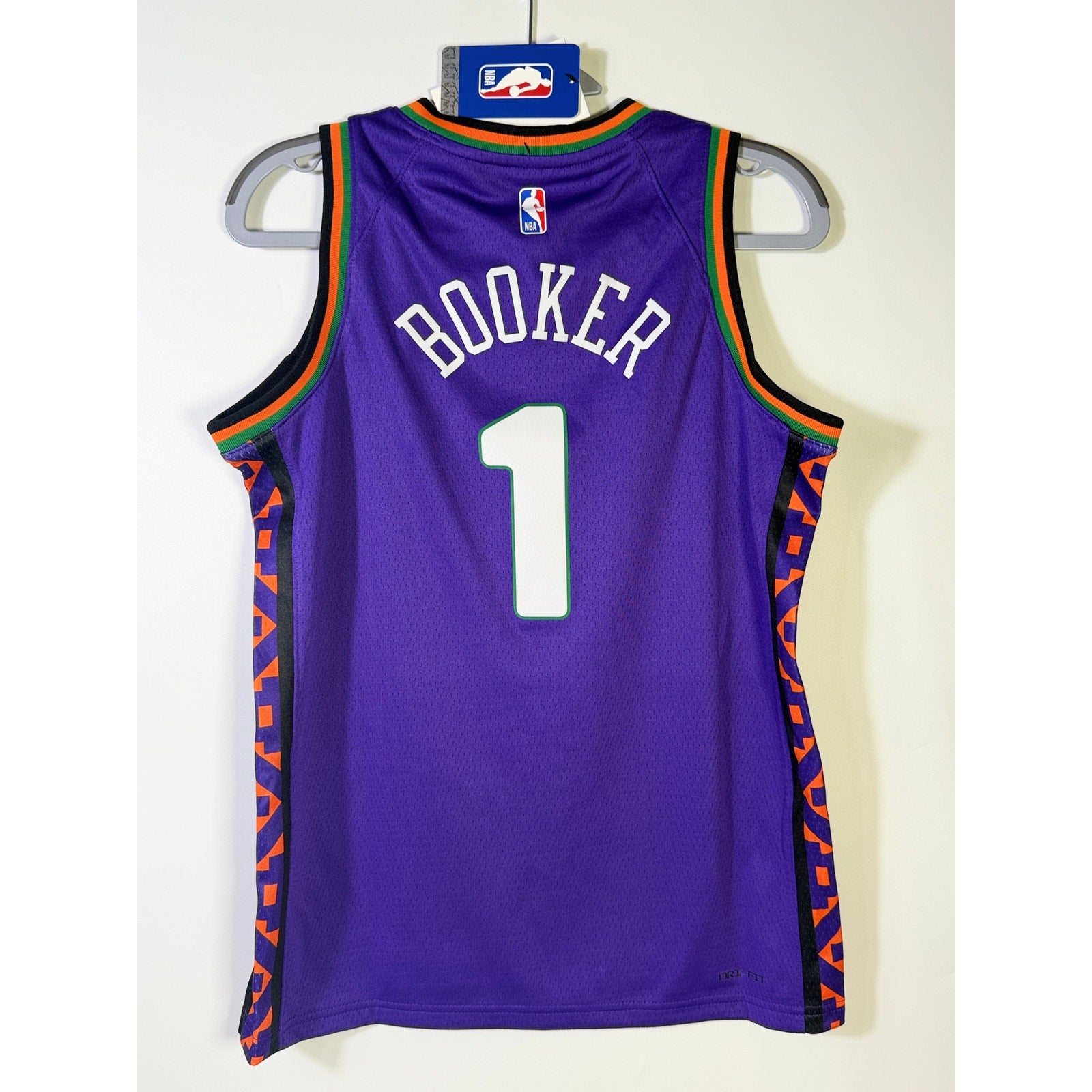 Nike NBA Phoenix Suns Devin Booker #1 City Edition youth swingman jersey in size M, featuring team and player details.