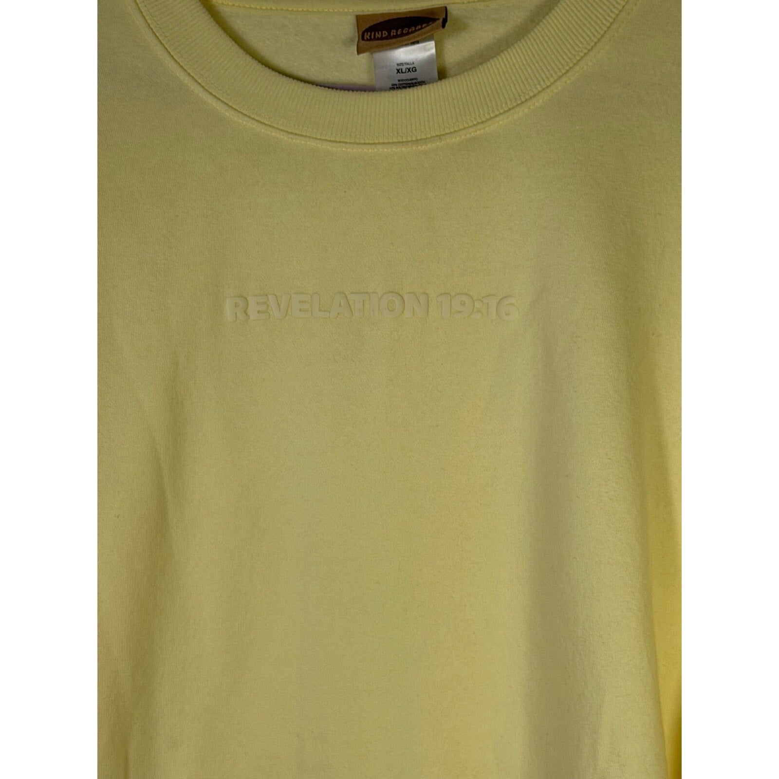 Yellow crewneck sweatshirt by Kind Regards with Revelation 19:16 Jesus Is King design, size XL, casual apparel for religious expression.