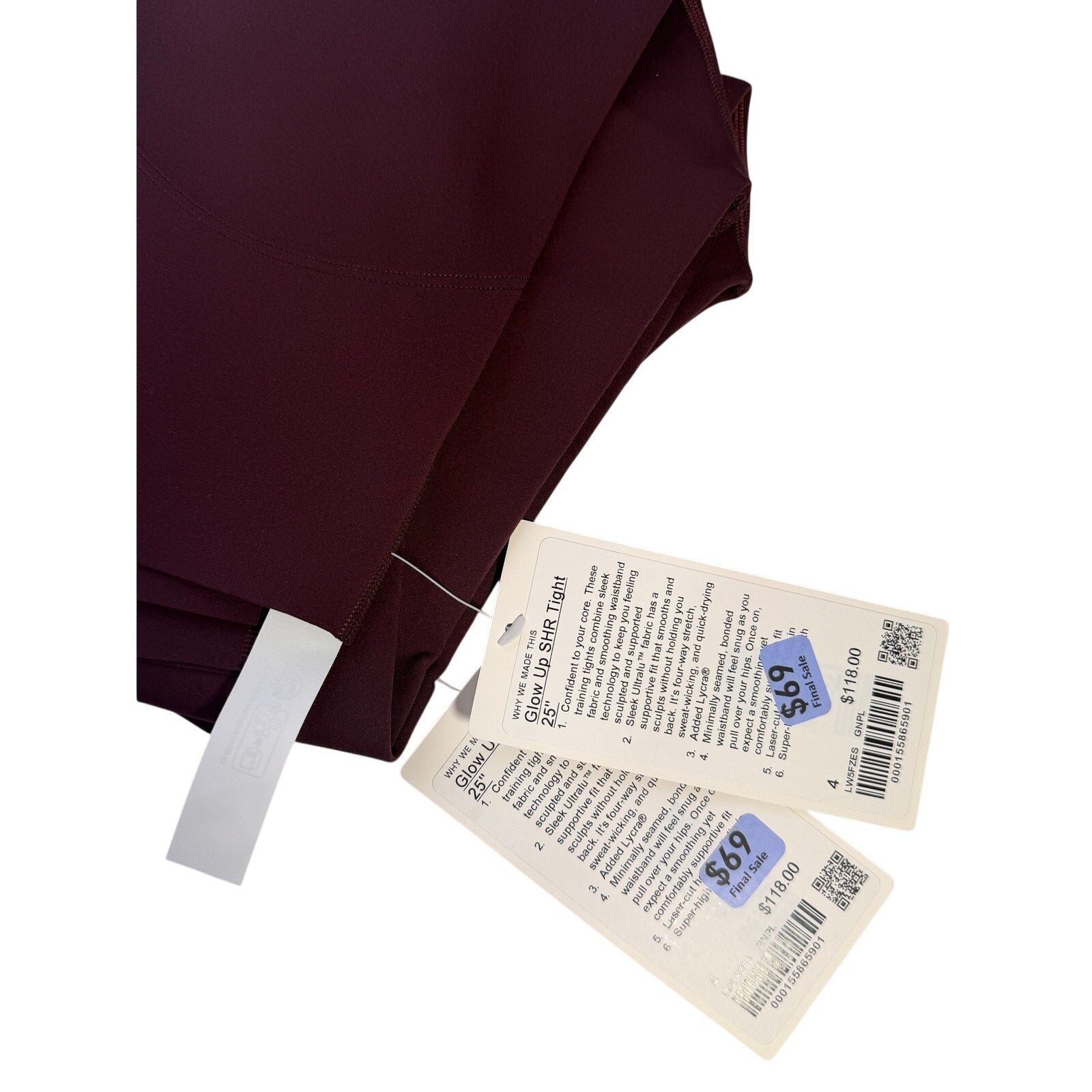 Lululemon Glow Up super-high-rise leggings in Goodnight Plum, size 4, with a snug fit and sleek design.
