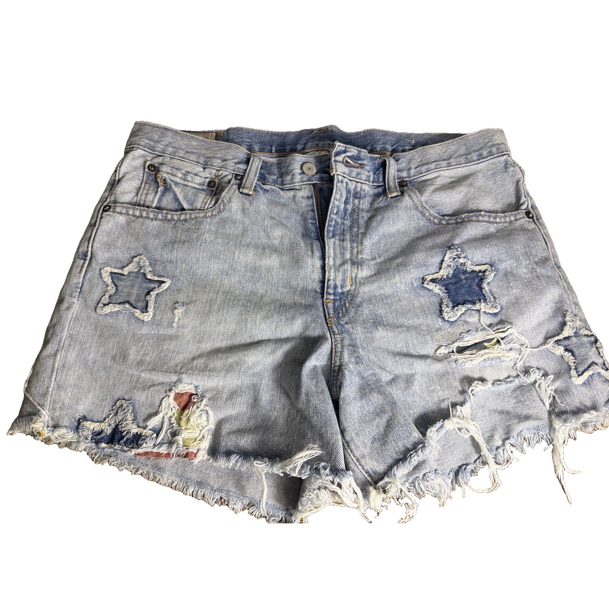 Polo Ralph Lauren women's distressed star patch denim cutoff shorts in light wash, size 29, with frayed hem and star patches.