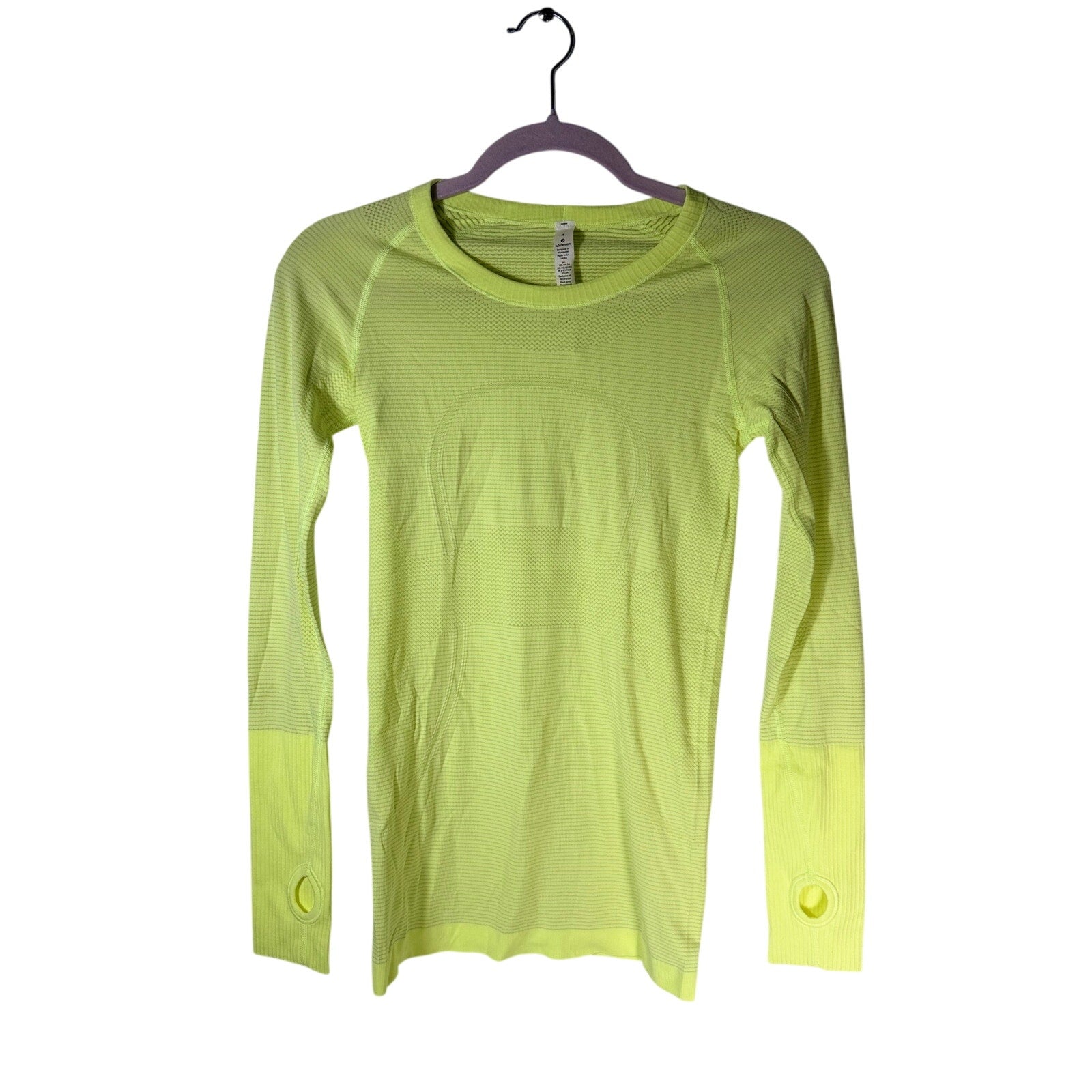Lululemon Swiftly Tech long sleeve shirt for women, size 4, in lightweight, breathable fabric with a fitted athletic design.