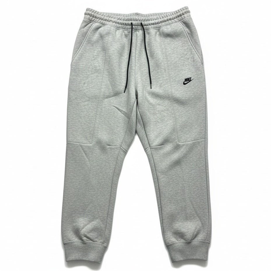 Women's Nike Tech Fleece Joggers in 2X size, showing the black athletic joggers with Nike logo and drawstring waist.