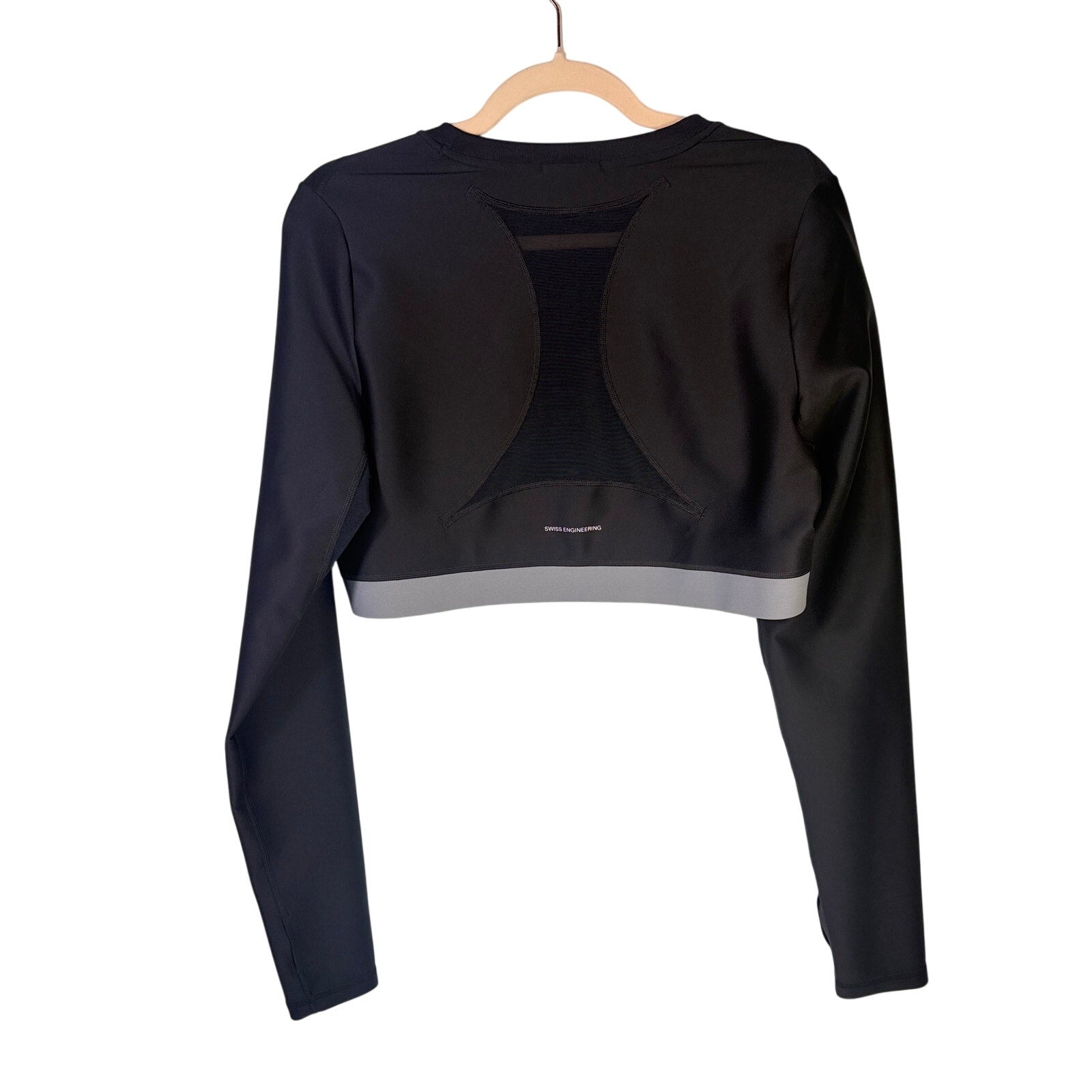 Black On Women’s Train Long-Sleeve Crop Athletic Top, size XL, shown on a hanger with a fitted style and athletic fabric.