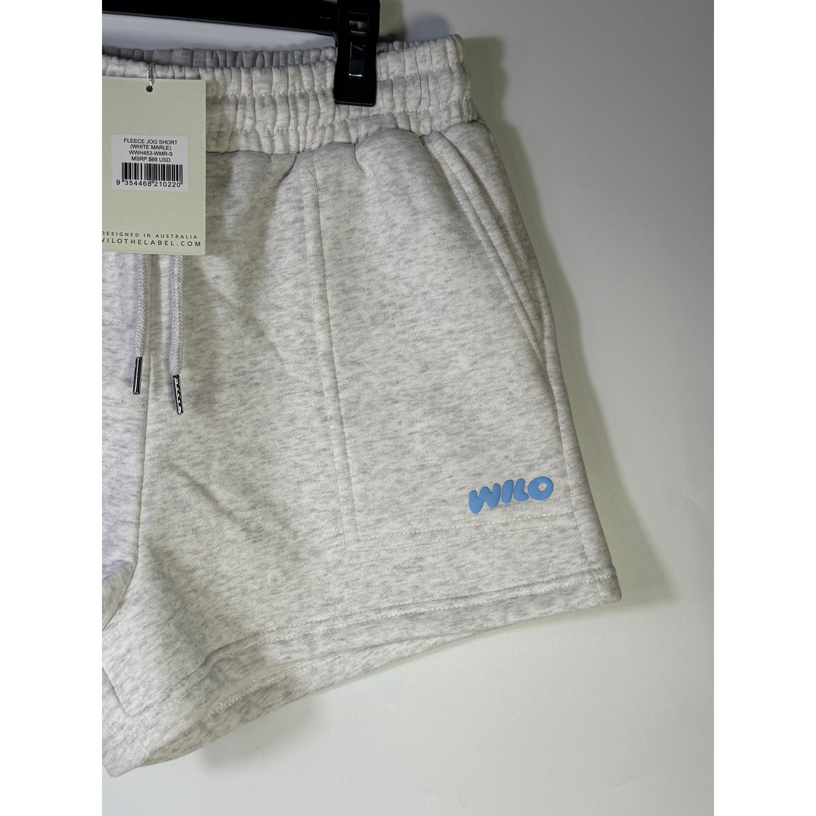 WILO Women’s fleece jog shorts in white marle, size M, featuring a comfortable fit and casual style.